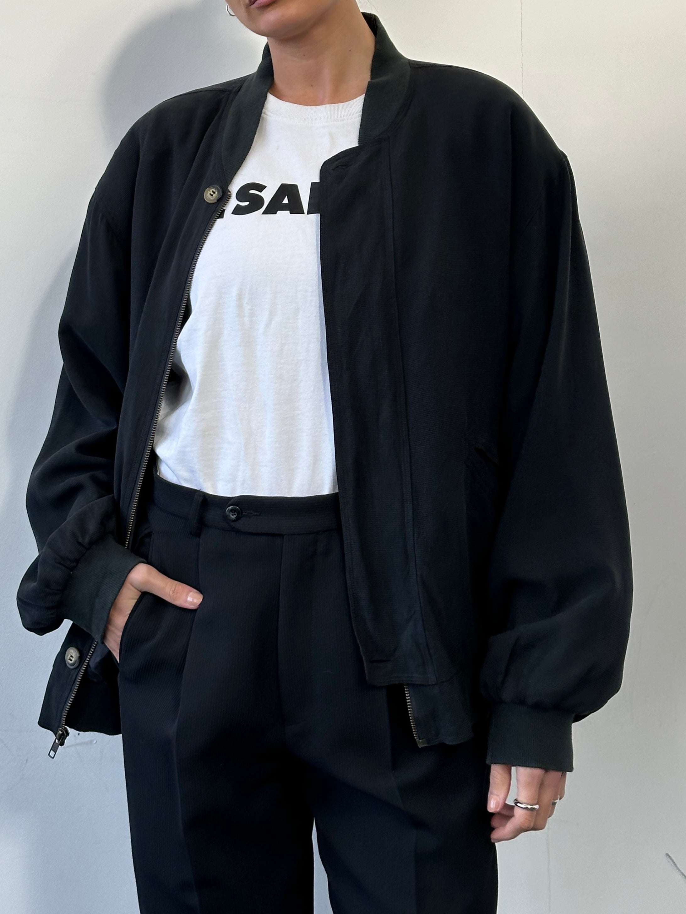 Vintage Italian vintage pure silk bomber jacket in size L, featuring a classic design with smooth silk fabric and stylish details.