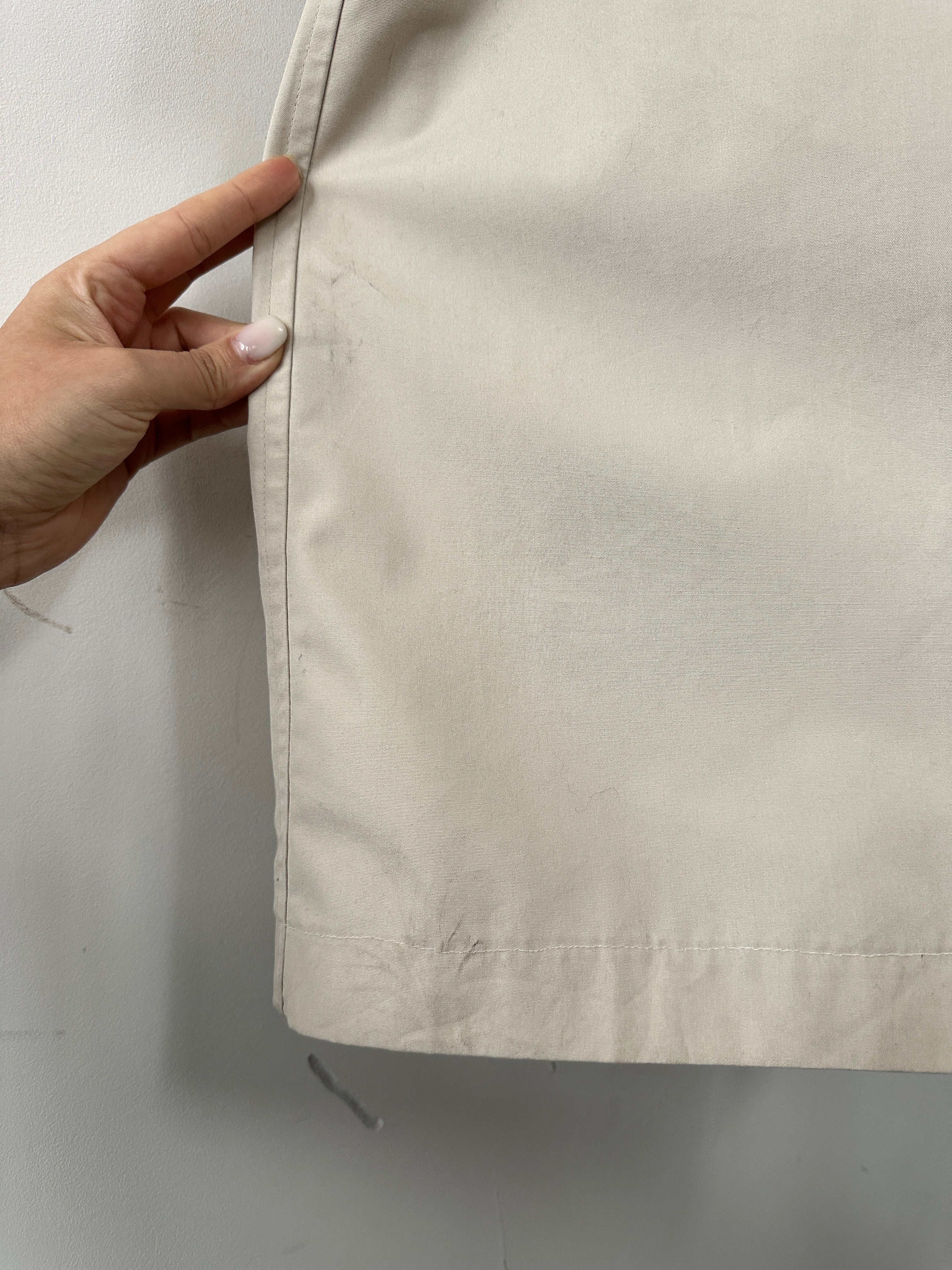 Christian Dior Monsieur cotton trench coat in XXL with concealed placket, stylishly displayed on a hanger.