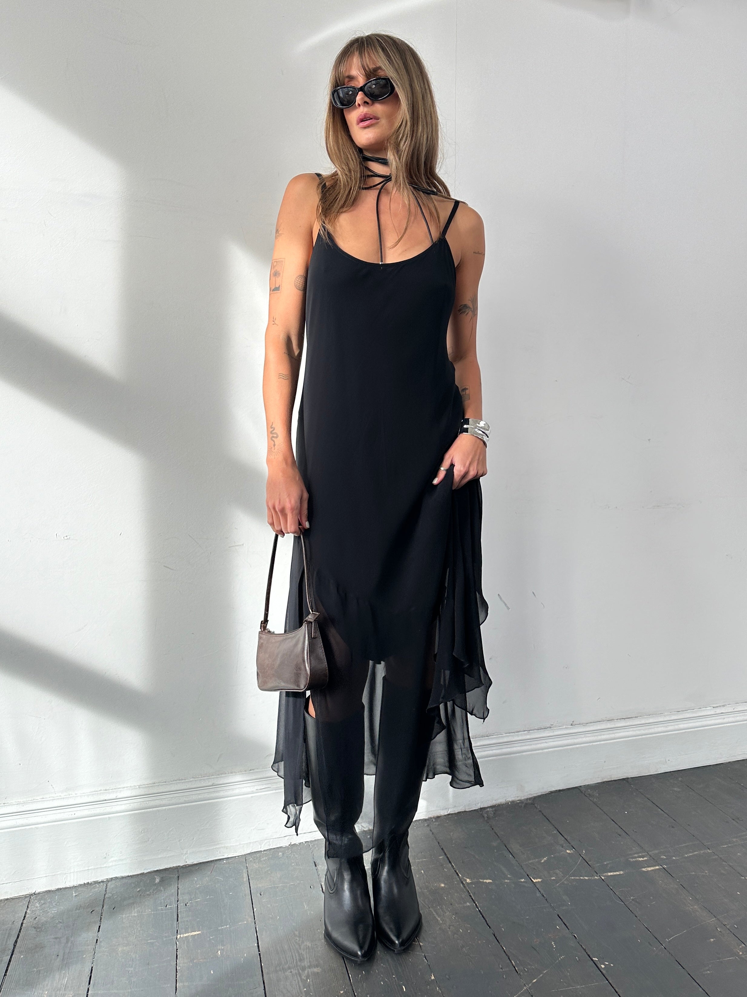 Vintage Italian split hem slip dress in size large, featuring a flowing fabric and elegant design, perfect for casual or evening wear.