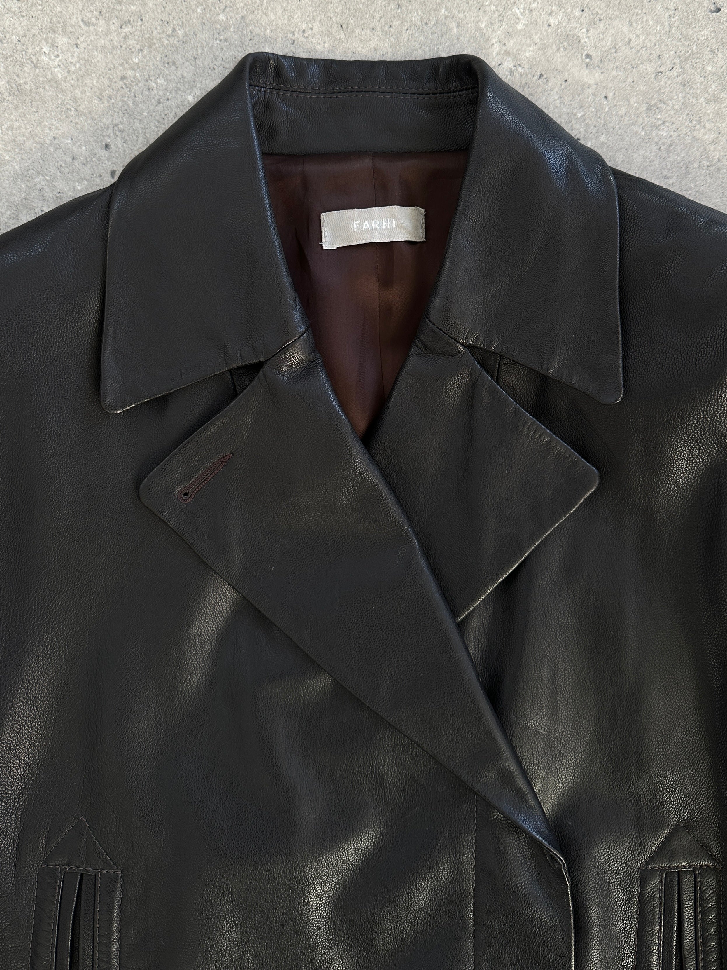 Nicole Farhi 1990s leather jacket in size S, shown hanging with detailed view of classic brown leather material.