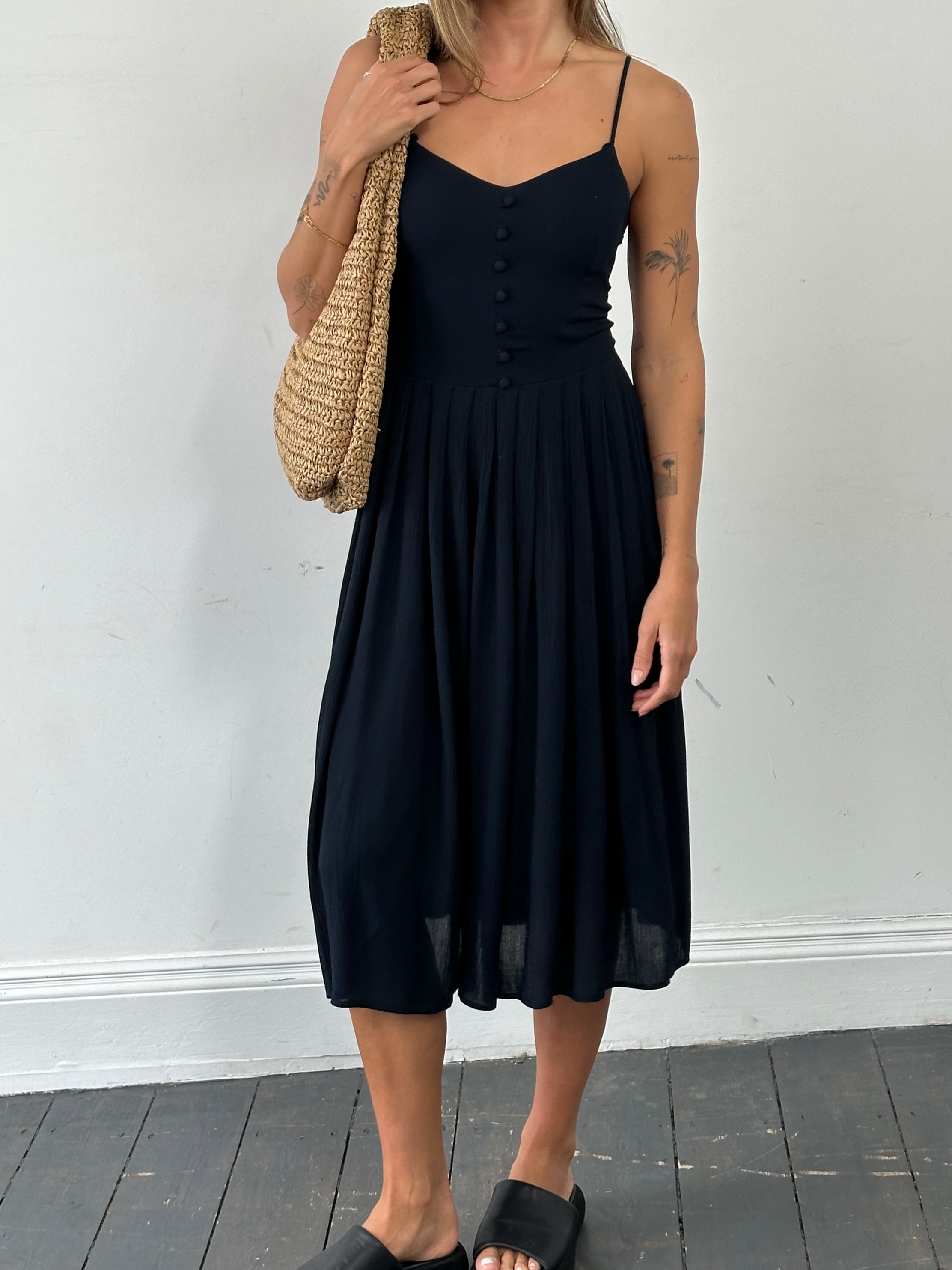 St Michael British pleated crinkle midi dress in size M, featuring a flowing silhouette and textured fabric.
