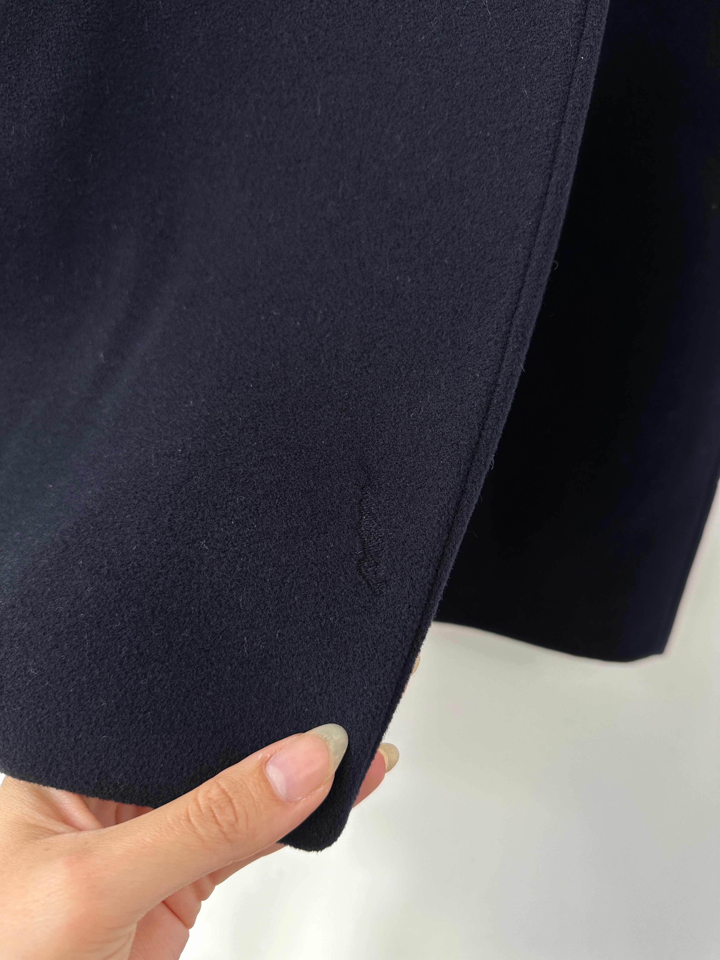 Emporio Armani pure wool single-breasted coat in size M, tailored fit, dark color, displayed on a mannequin.