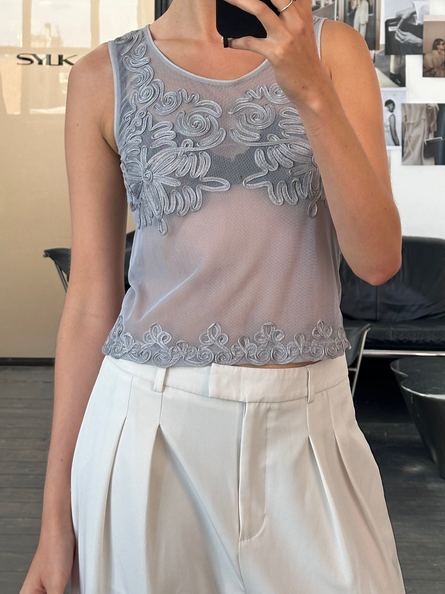 Armani Jeans 1990s sheer appliqué vest top in black with delicate sheer fabric and floral appliqué details, size S/M.