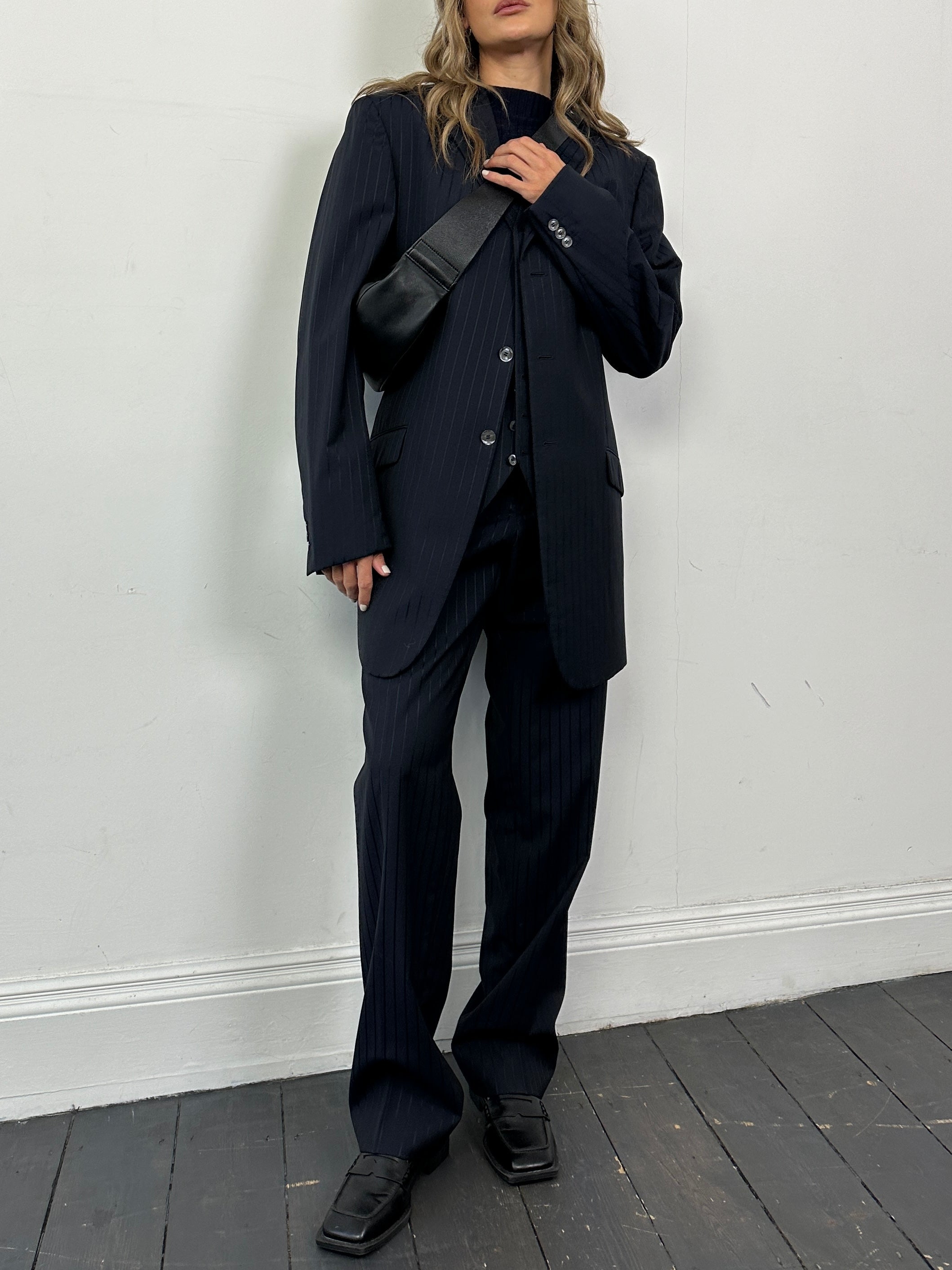 Pal Zileri pinstripe virgin wool three-piece suit in size 44R/W34, tailored fit, with matching jacket, vest, and trousers.