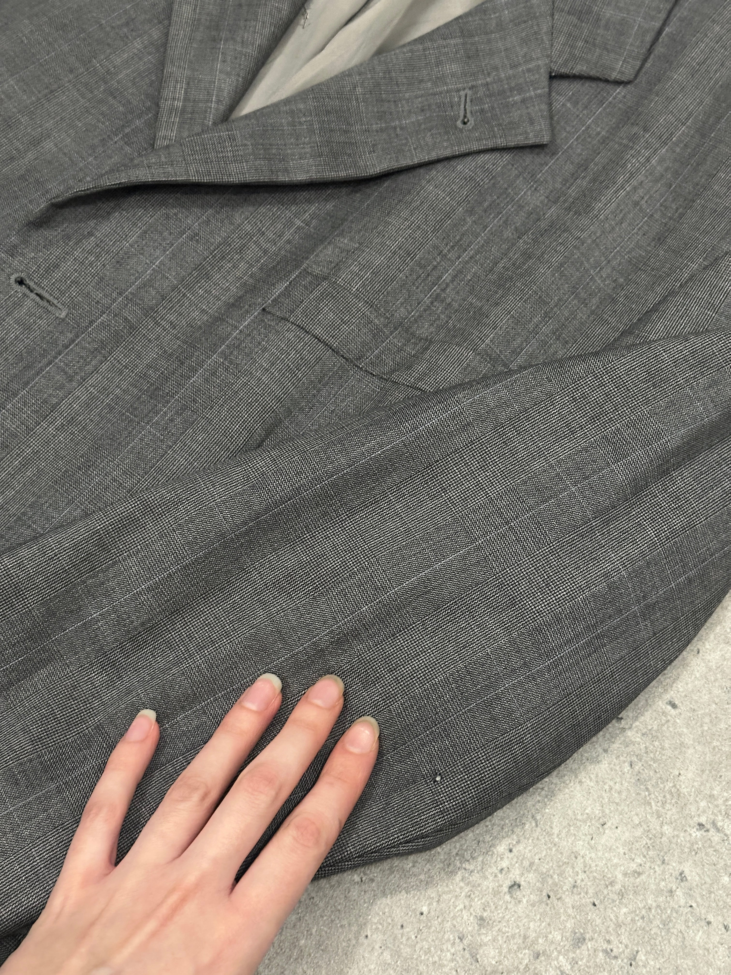 Yves Saint Laurent Pour Homme 1990s pure wool single-breasted blazer in size 40R/L, shown on a hanger with a classic lapel design.