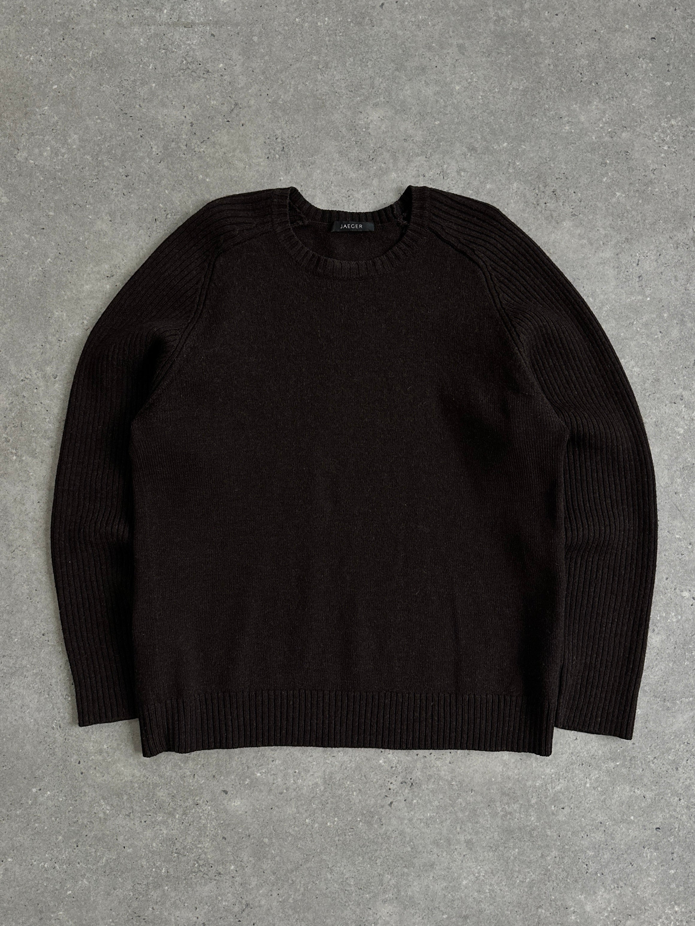 Jaeger Pure Merino Wool Jumper in size L/XL, featuring a soft, knit design perfect for casual or stylish wear.
