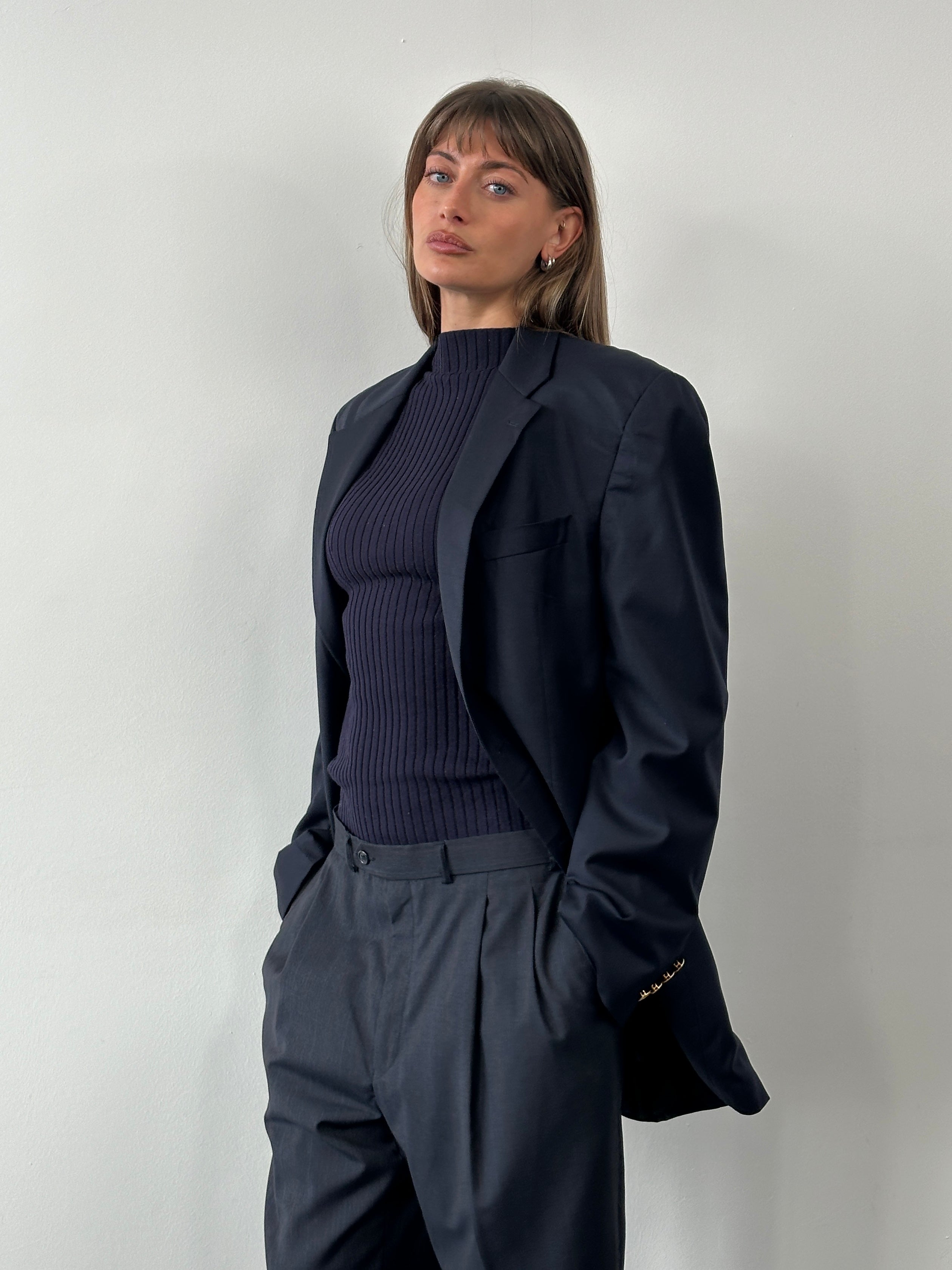 Ralph Lauren 1990s pure wool bespoke button blazer in size 40L/XL, tailored fit with classic lapel and button closure.