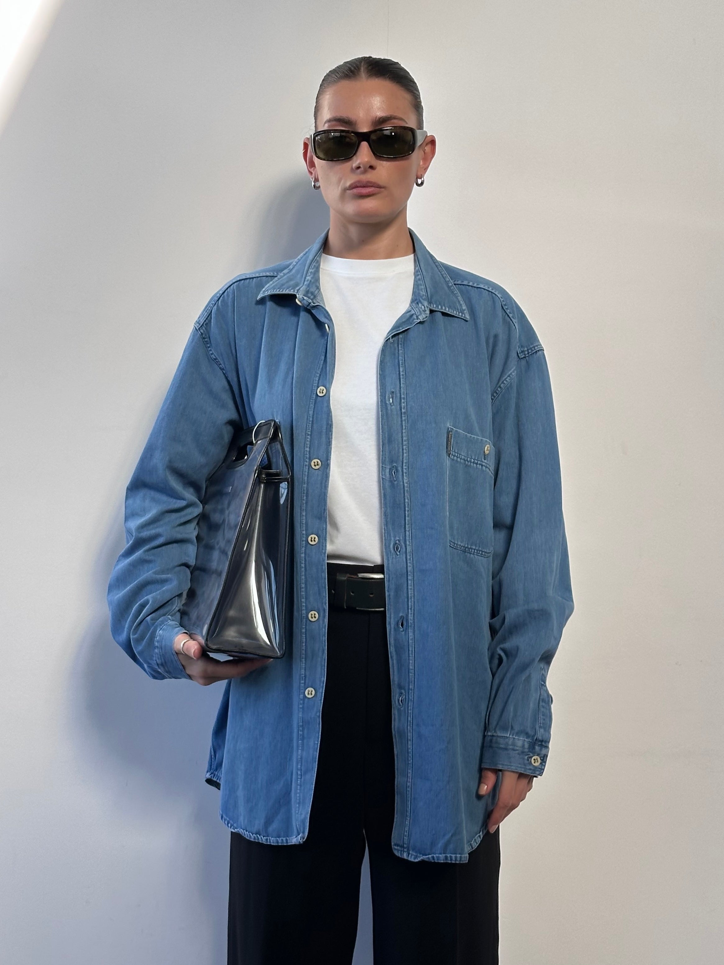 Armani Jeans pure cotton denim shirt in size XL, featuring classic button-down design and stylish blue denim fabric.