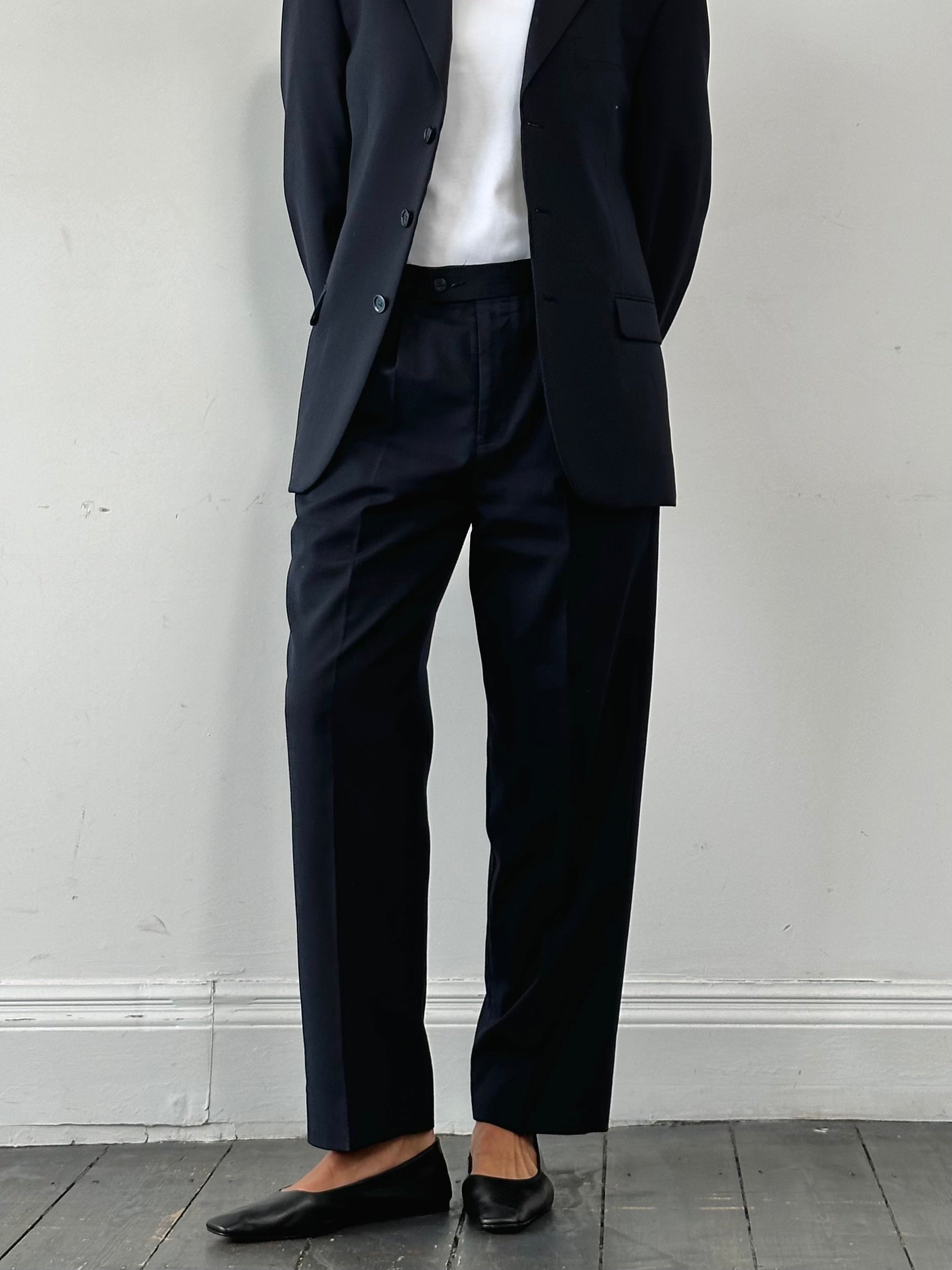 Vintage wool high-waisted straight-leg trousers in W32, showcasing classic fit and textured fabric.