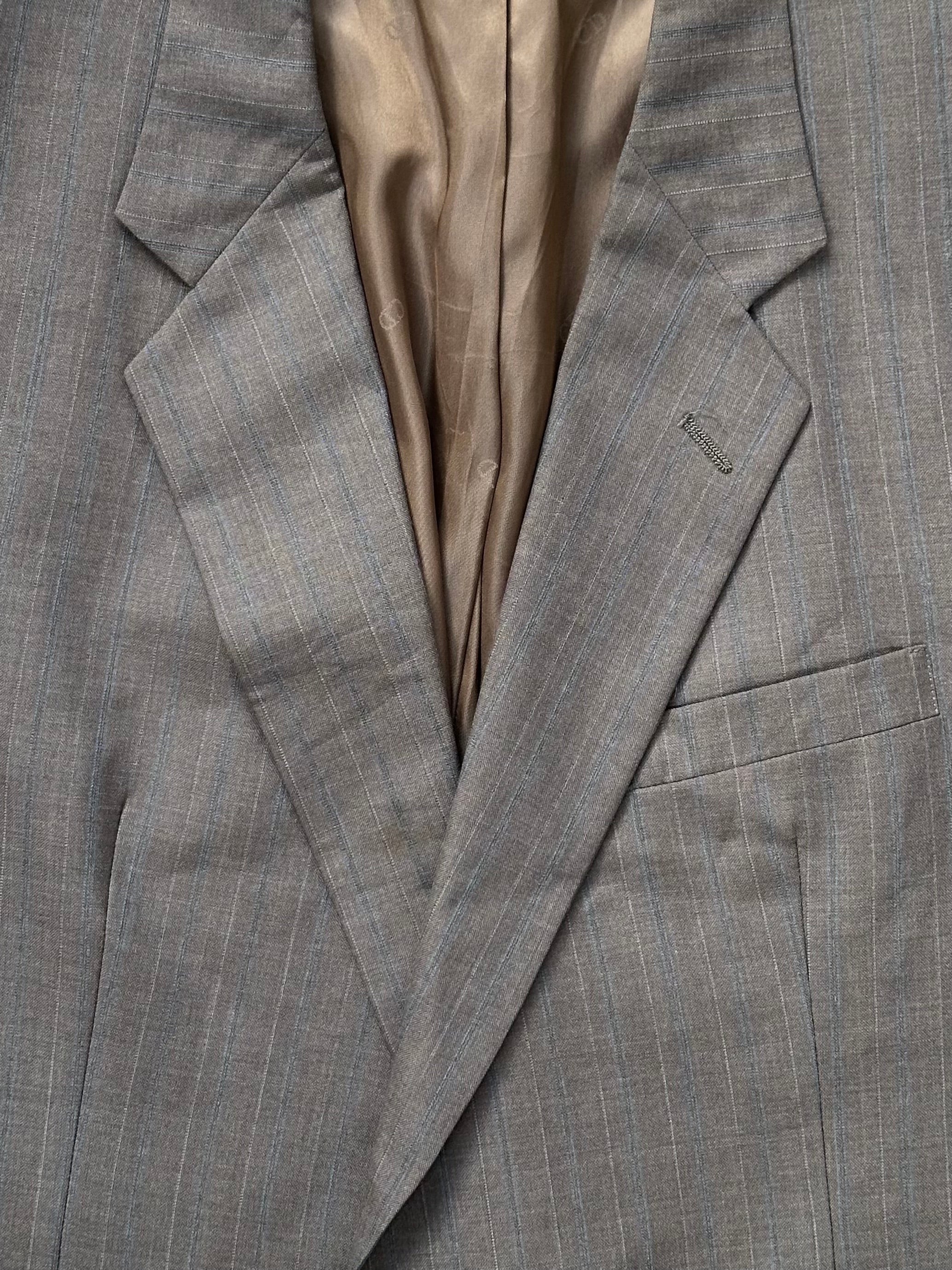 Christian Dior Monsieur 1990s striped single-breasted blazer in size 44R/XL, featuring classic tailoring and bold stripe pattern.