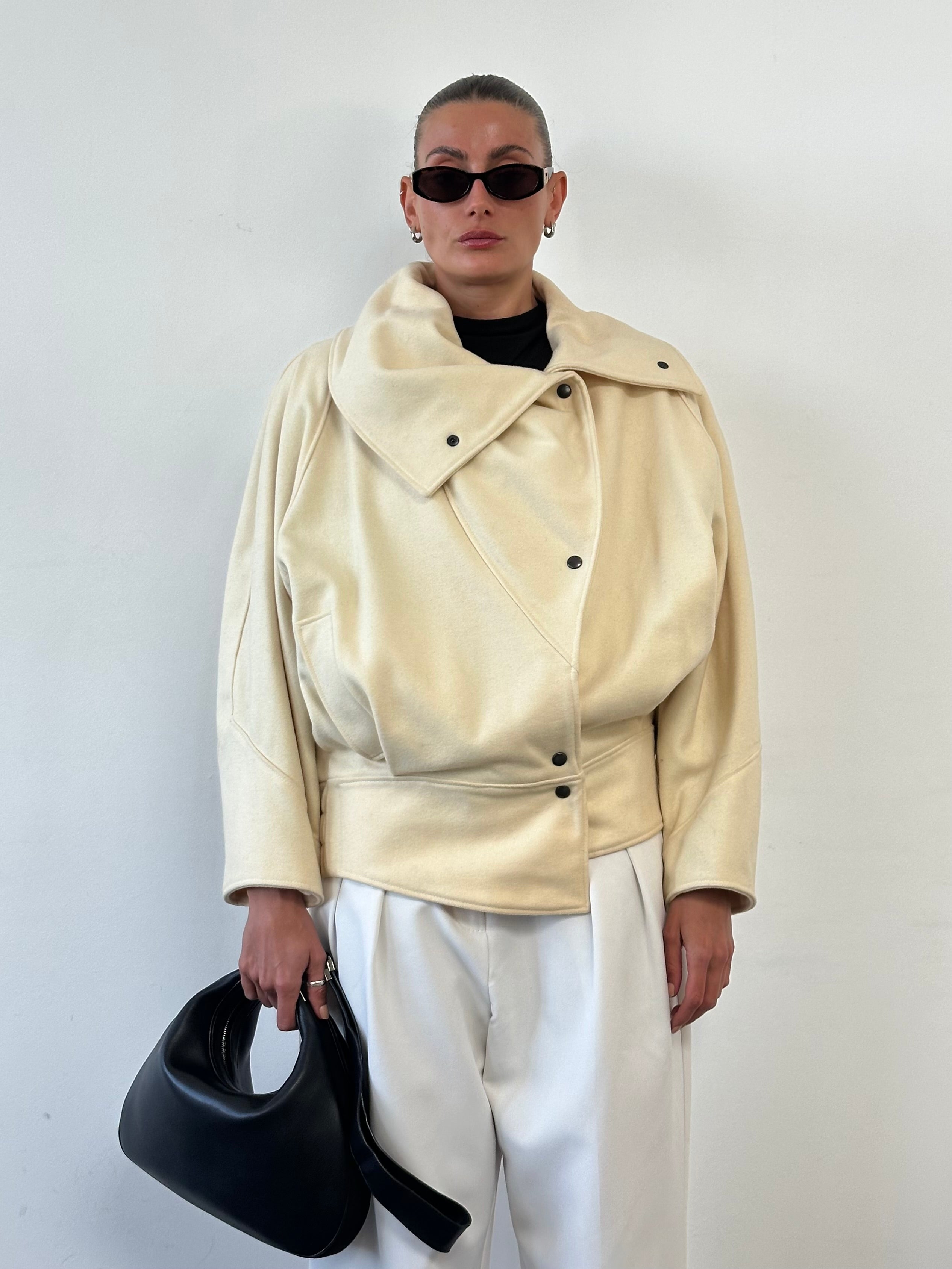 Vintage asymmetric wool bomber jacket with funnel neck in classic style, shown in black with a relaxed fit.