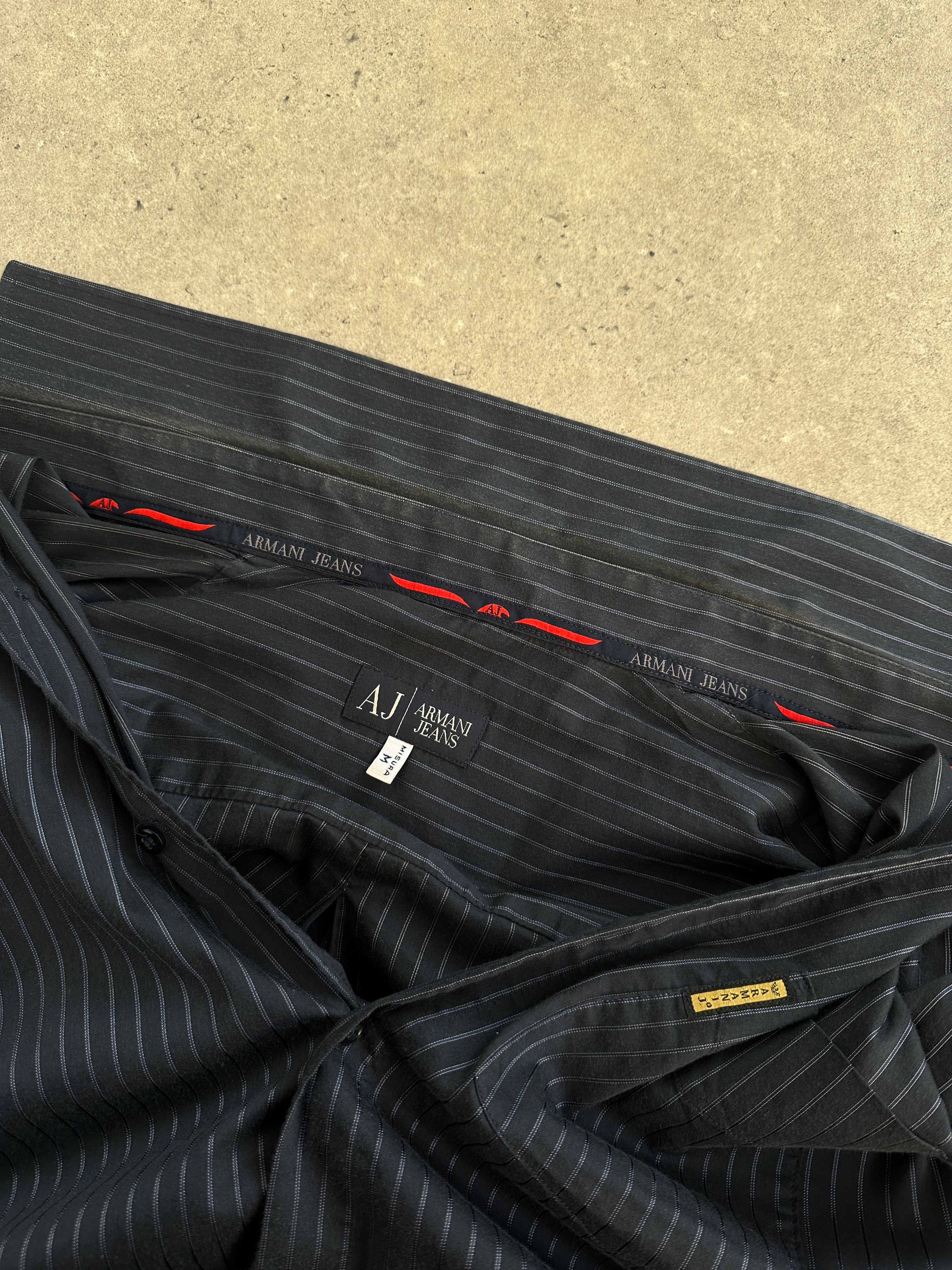 Armani Jeans stripe cotton logo shirt in size M, featuring a stylish striped design and the Armani logo on the front.