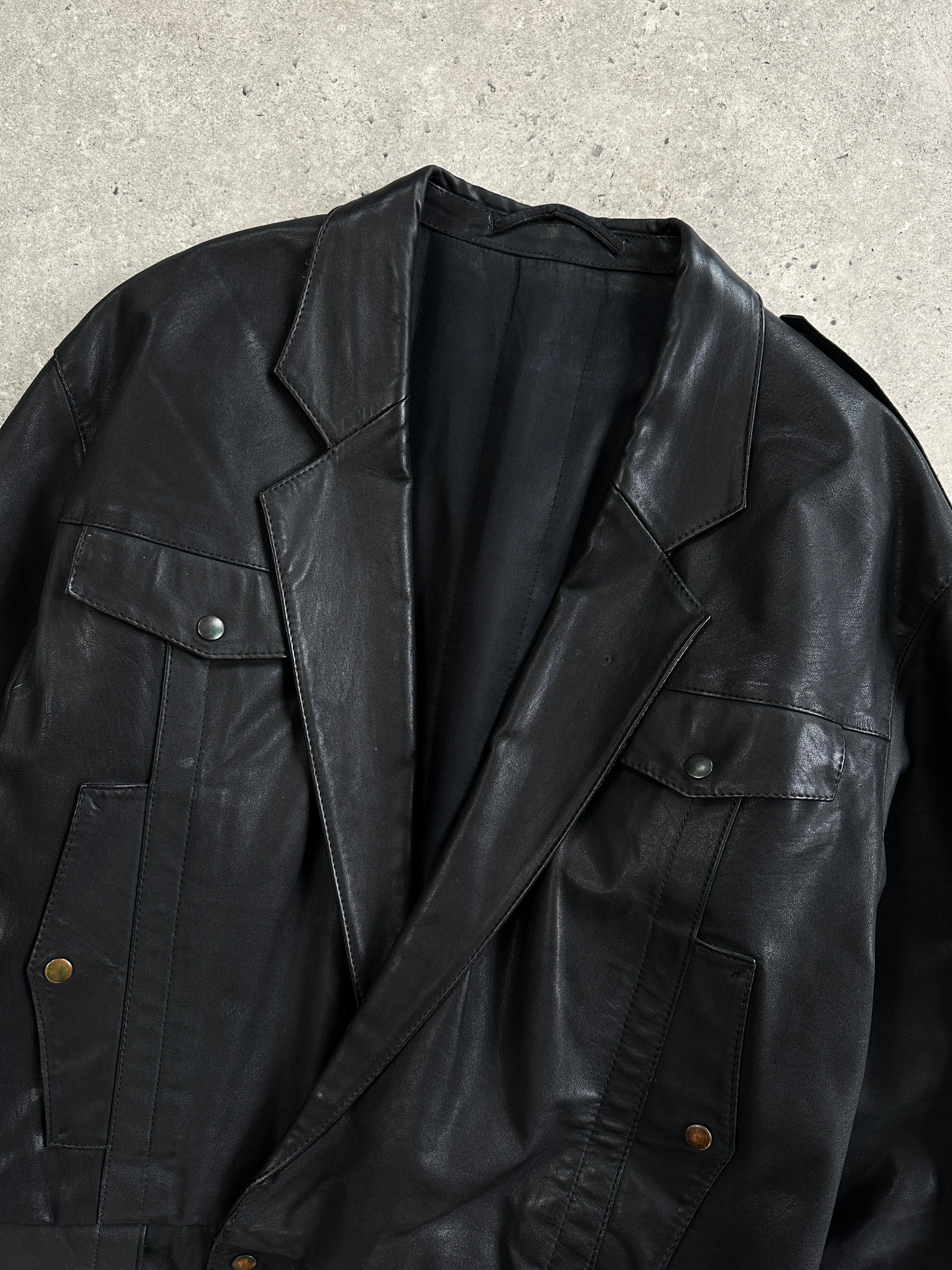 Vintage leather bomber jacket in size small, featuring classic design and detailed stitching on the front and collar.