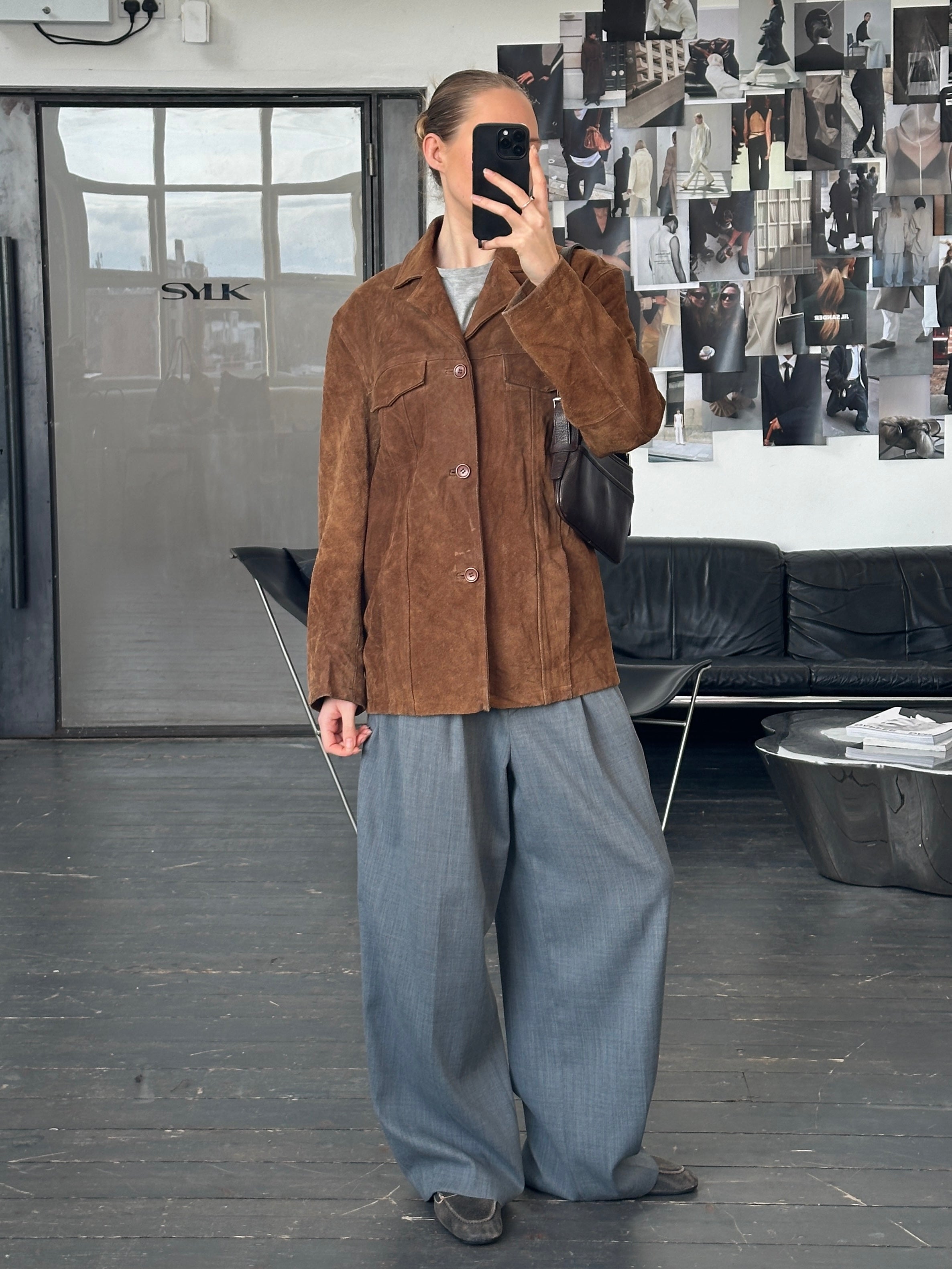 Vintage 1990s suede leather jacket in size large, featuring classic design, soft texture, and authentic vintage style.