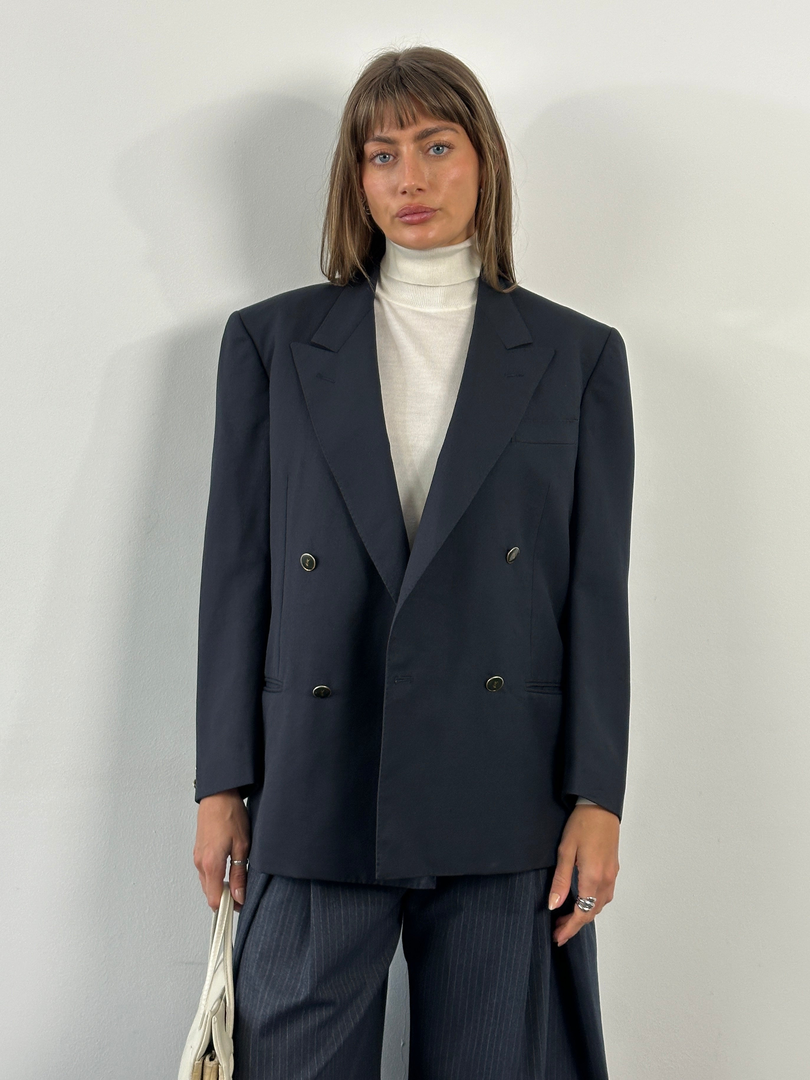Yves Saint Laurent 1990s bespoke button wool double-breasted blazer in black, size 38R/M, featuring classic tailored design.