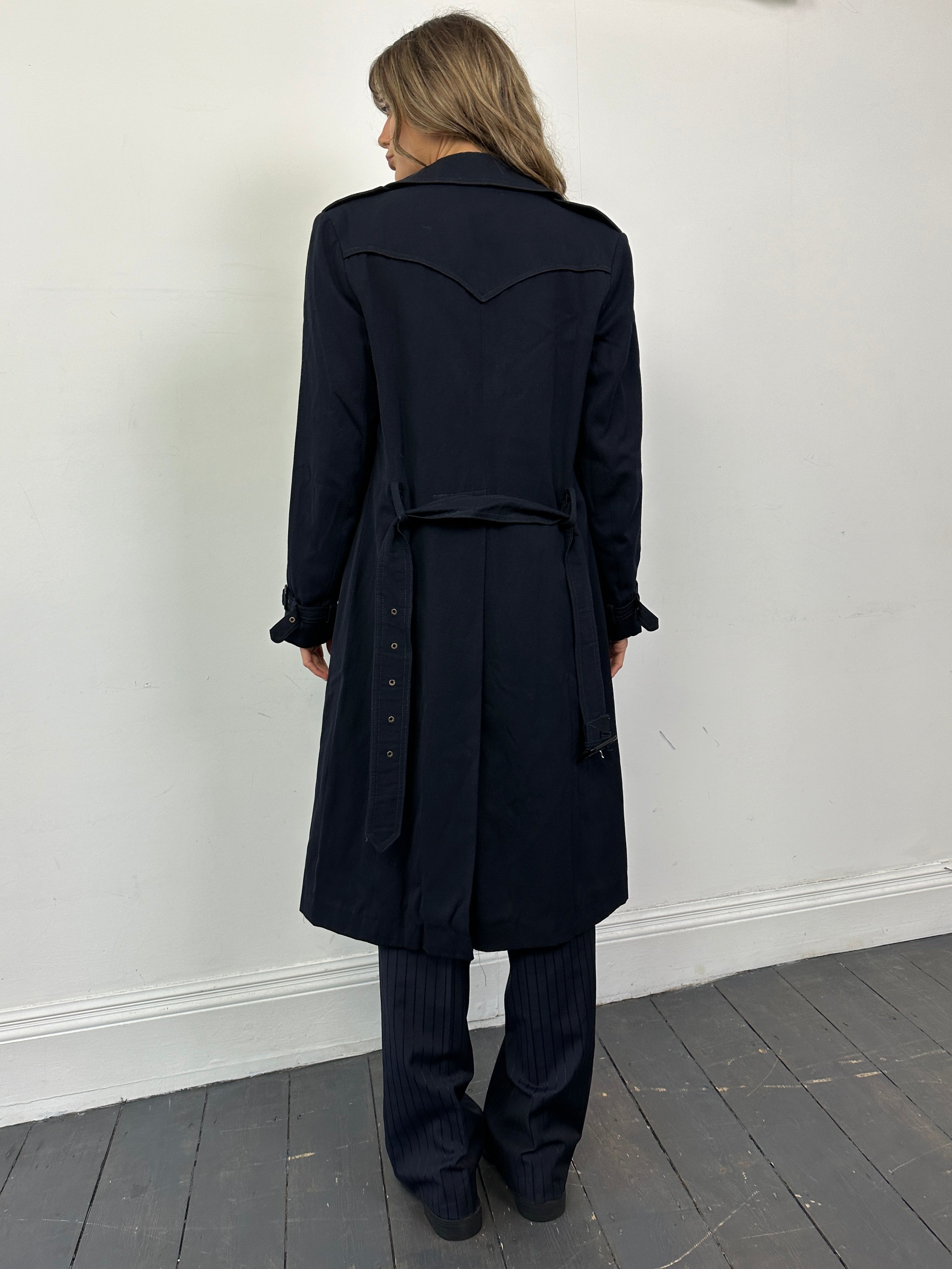 Vintage wool double-breasted belted trench coat in size small, featuring classic style and tailored fit.