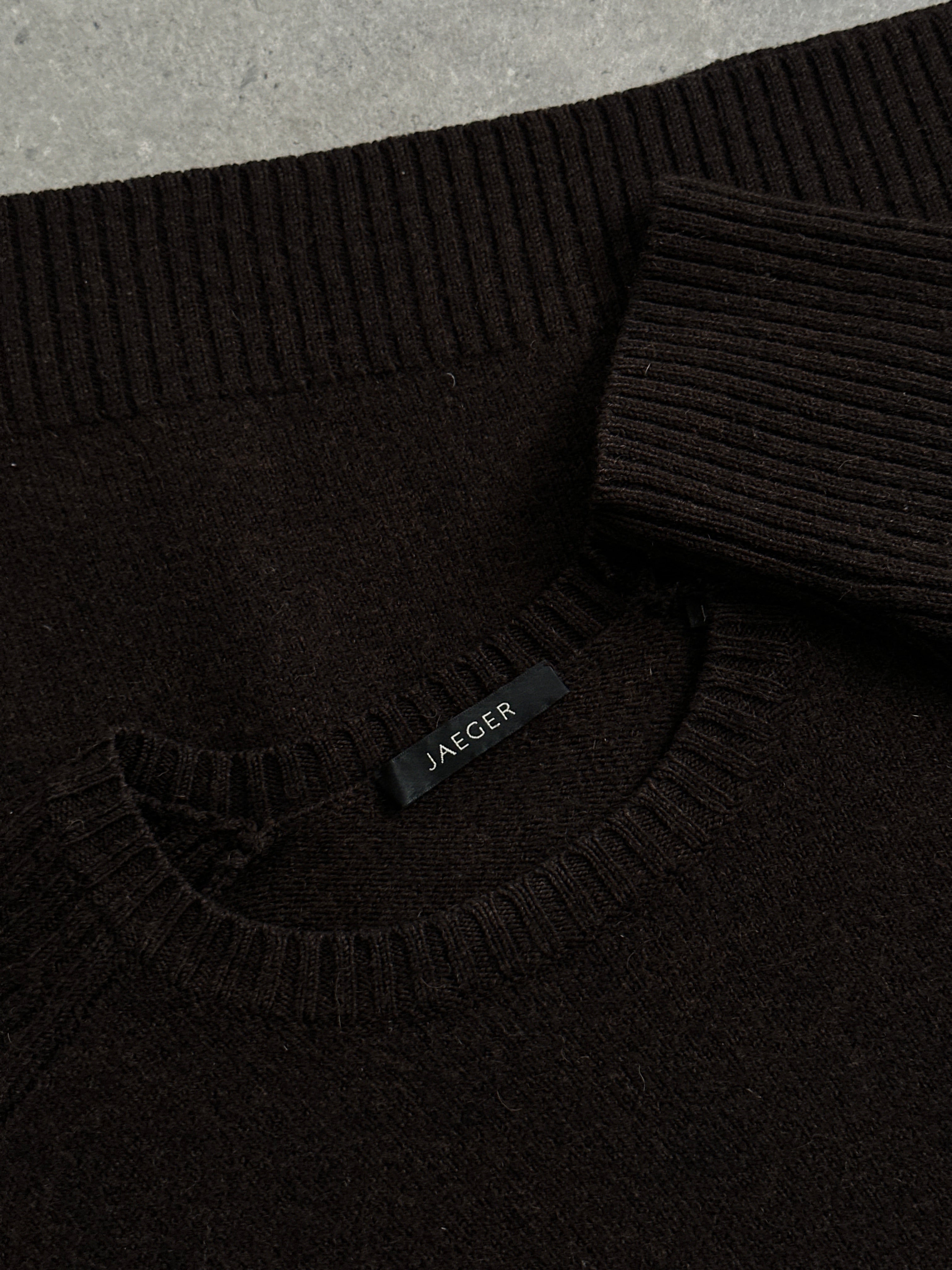Jaeger pure merino wool jumper in size L/XL, featuring a classic knit design and soft, high-quality fabric.