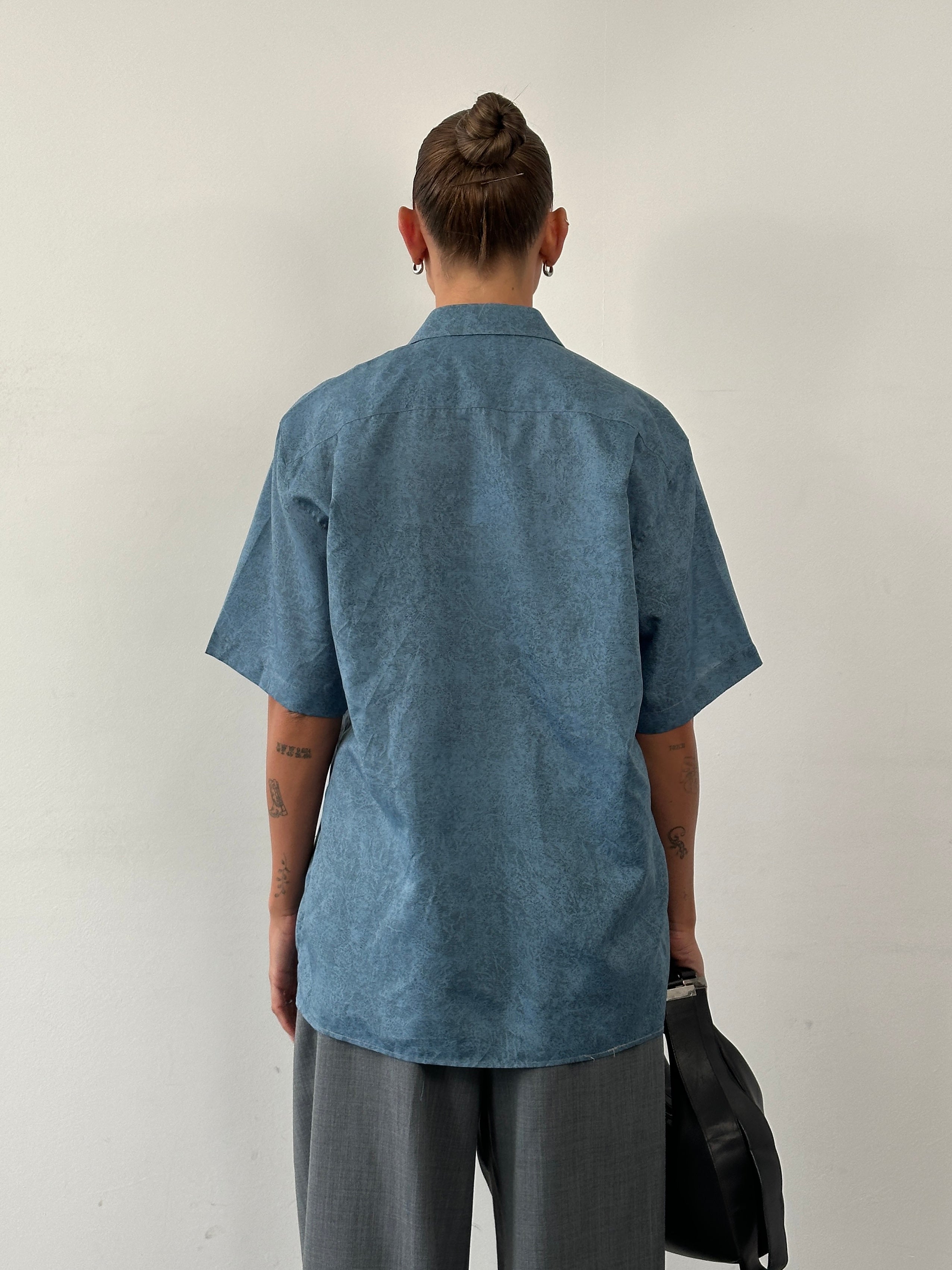 Christian Dior silk print short sleeve logo shirt in size L, featuring a stylish Dior design and classic short sleeve fit.