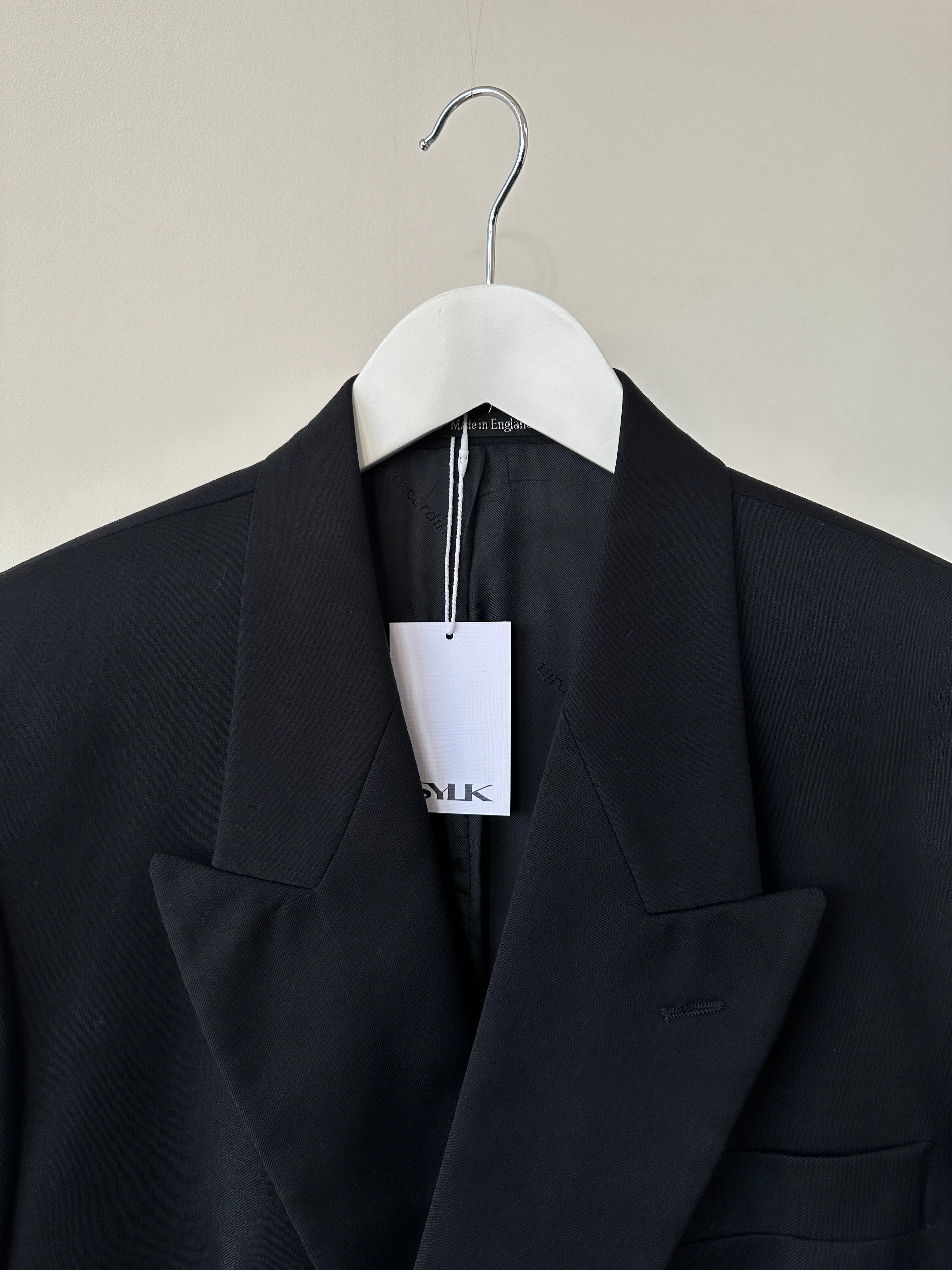 Pierre Cardin pure wool double-breasted blazer in size 40R/L, tailored fit with classic lapels and button details.