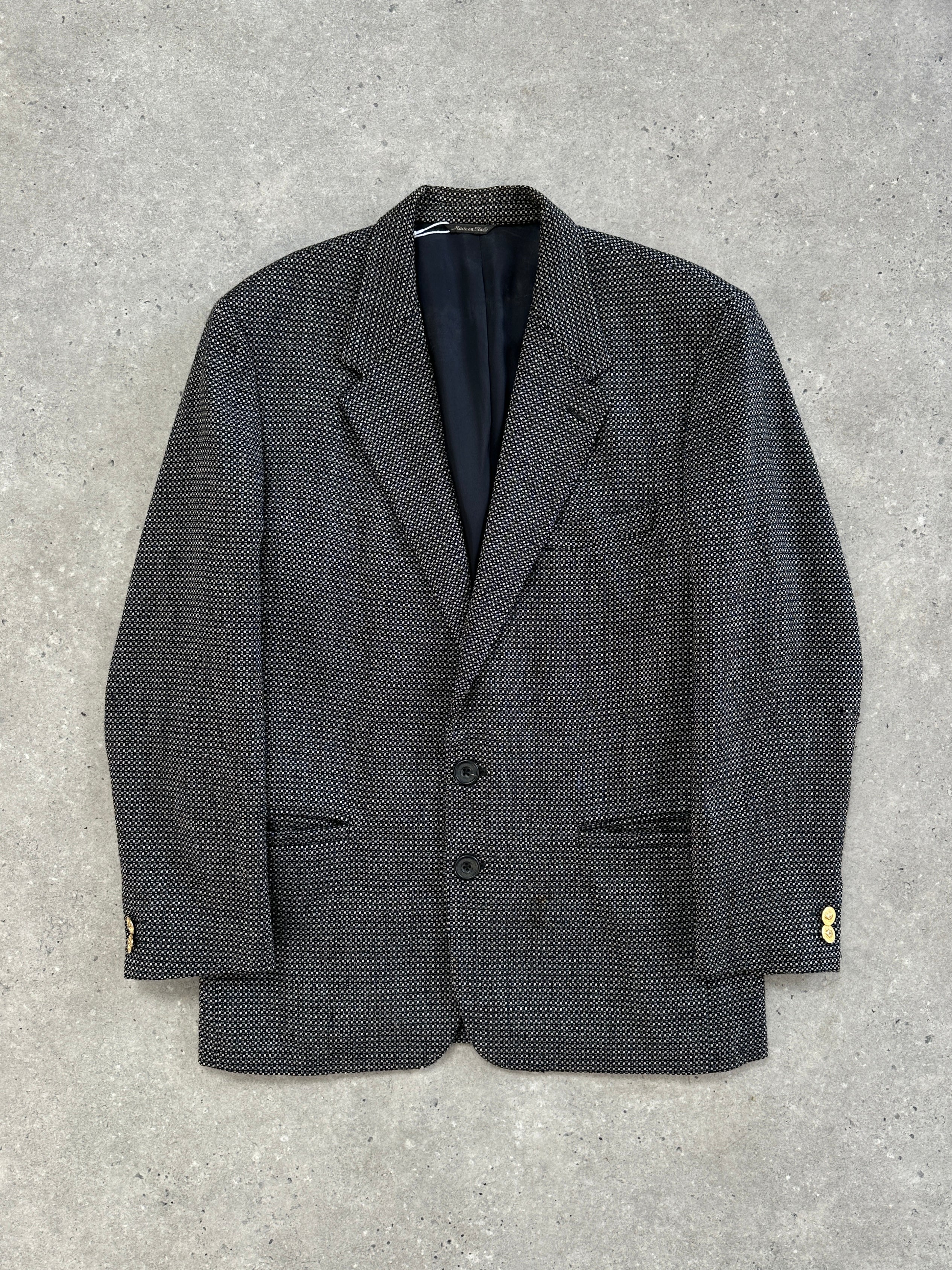 Versace Versus 90s pure wool single-breasted blazer in size 40R/L, tailored fit with classic lapels and button closure.