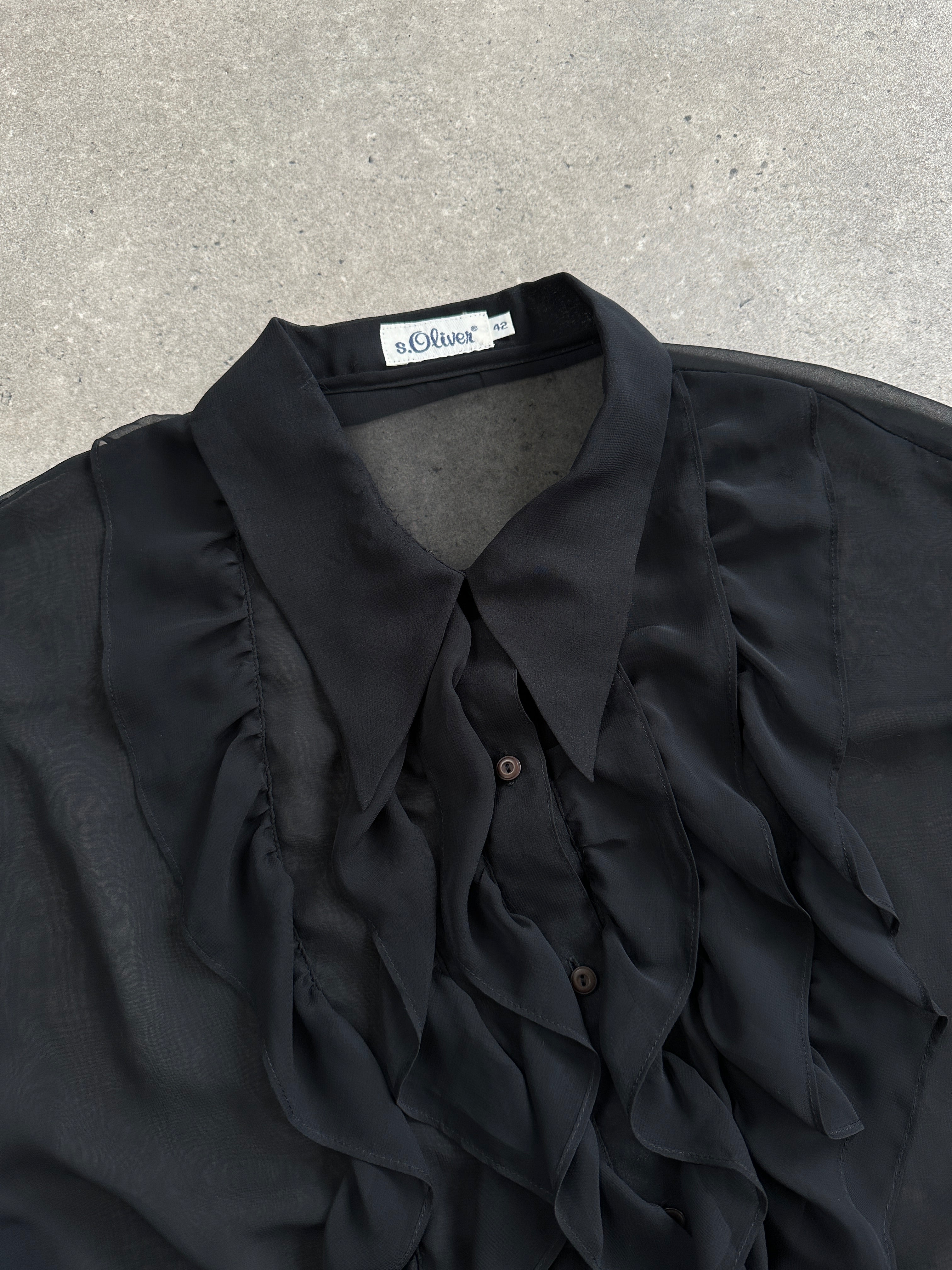 Vintage 00s sheer ruffle shirt in size L/XL, featuring delicate fabric and feminine ruffle details.