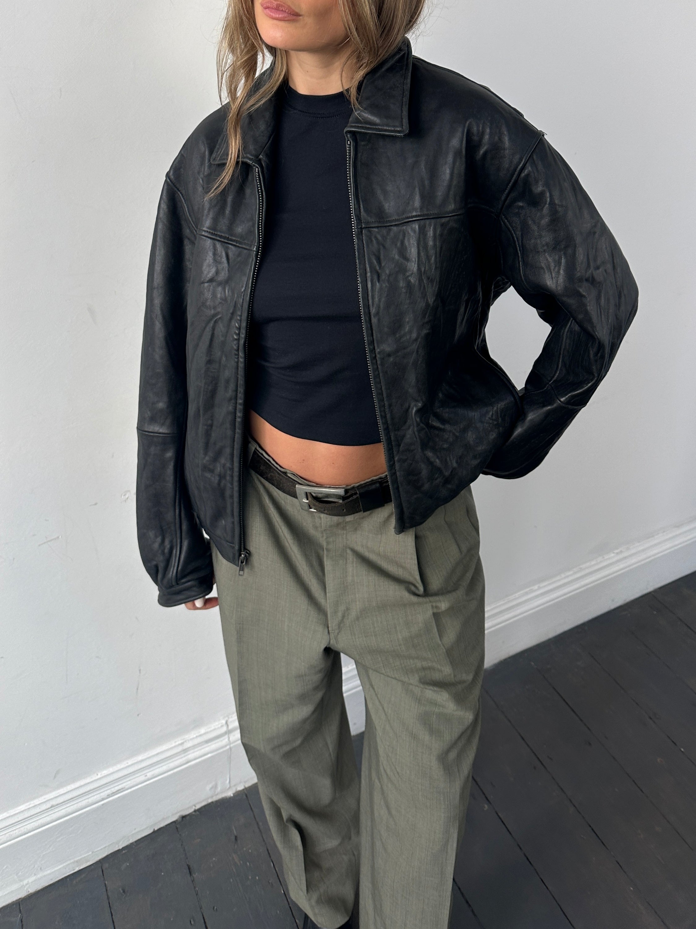 Vintage minimal soft leather bomber jacket in size M, featuring a sleek design and classic style.
