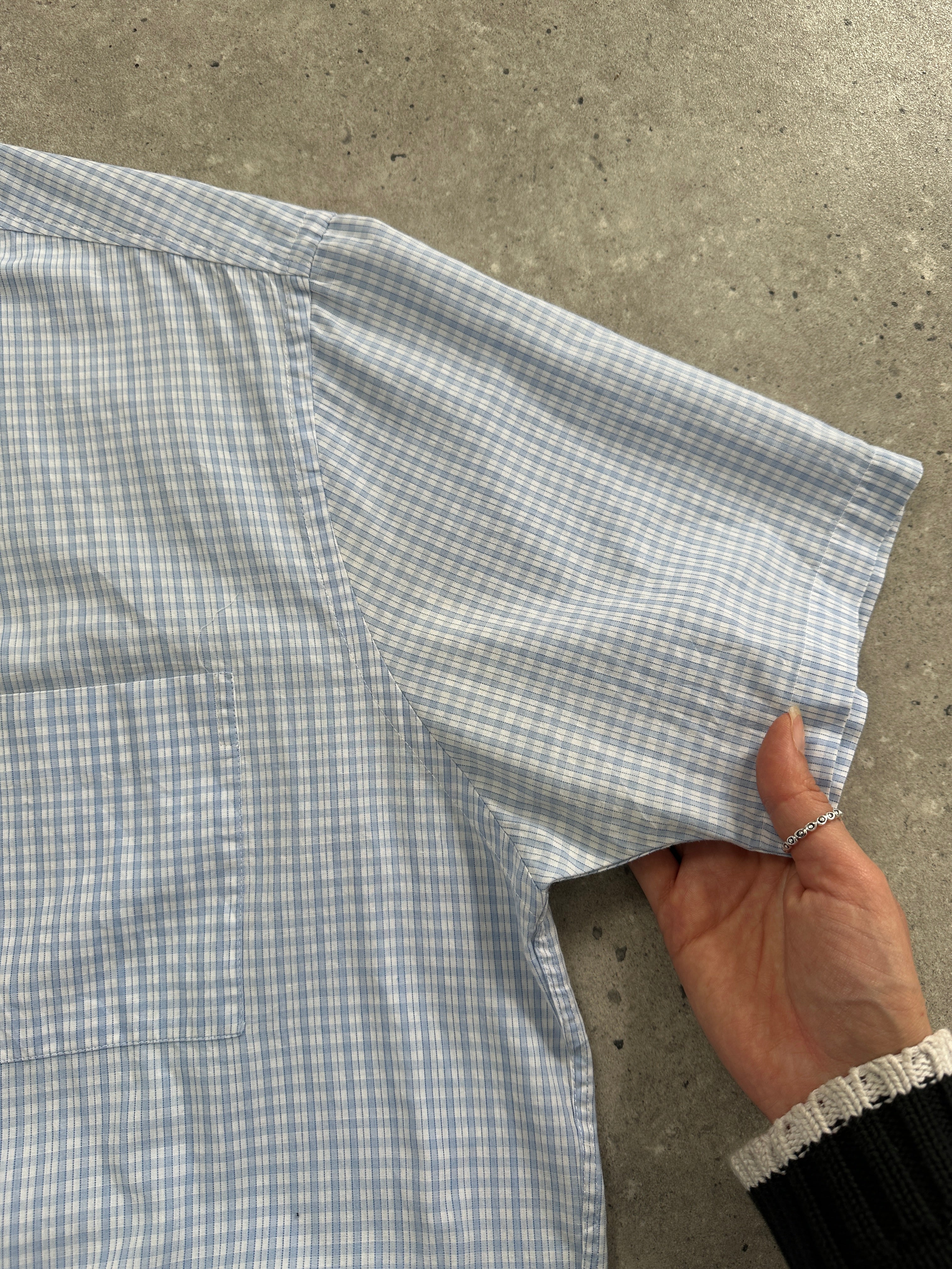 Yves Saint Laurent men's check logo cotton shirt in black and white, 2000s style, with button-up front and classic collar.