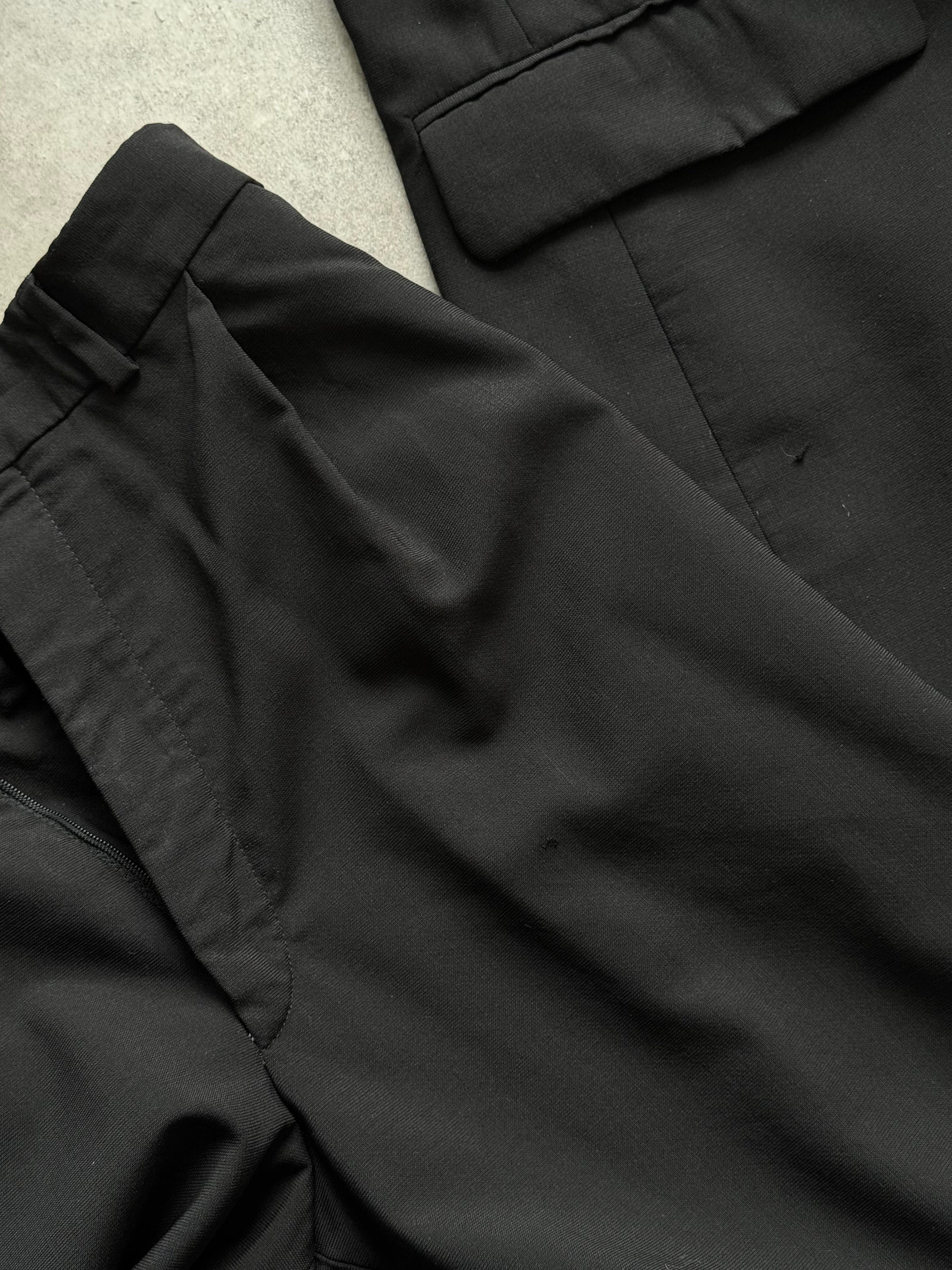 Balmain 1990s pure wool single-breasted suit in size 42S/W34, tailored fit with classic lapel and structured design.
