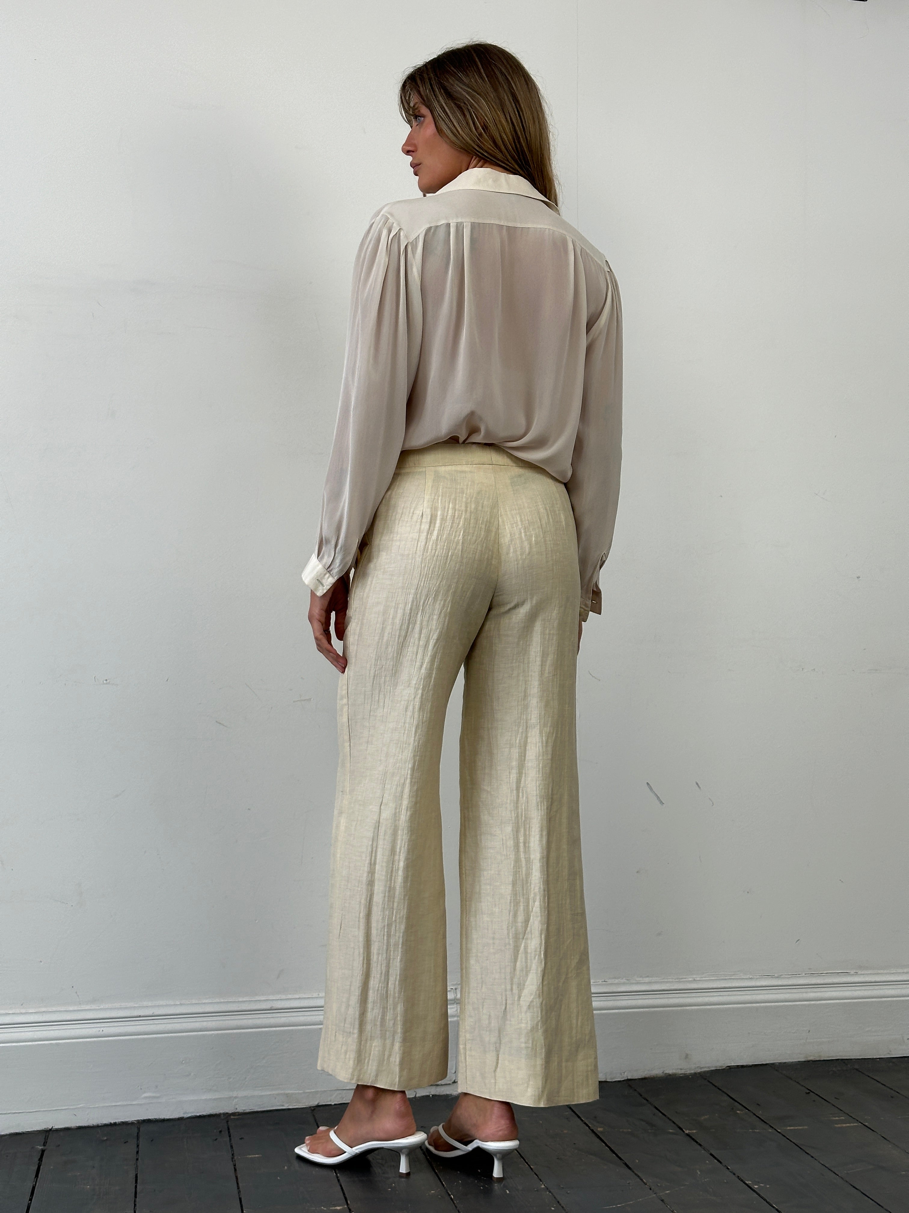 Max Mara linen silk low waist crinkle trousers in size W30, showcasing relaxed fit and textured fabric.