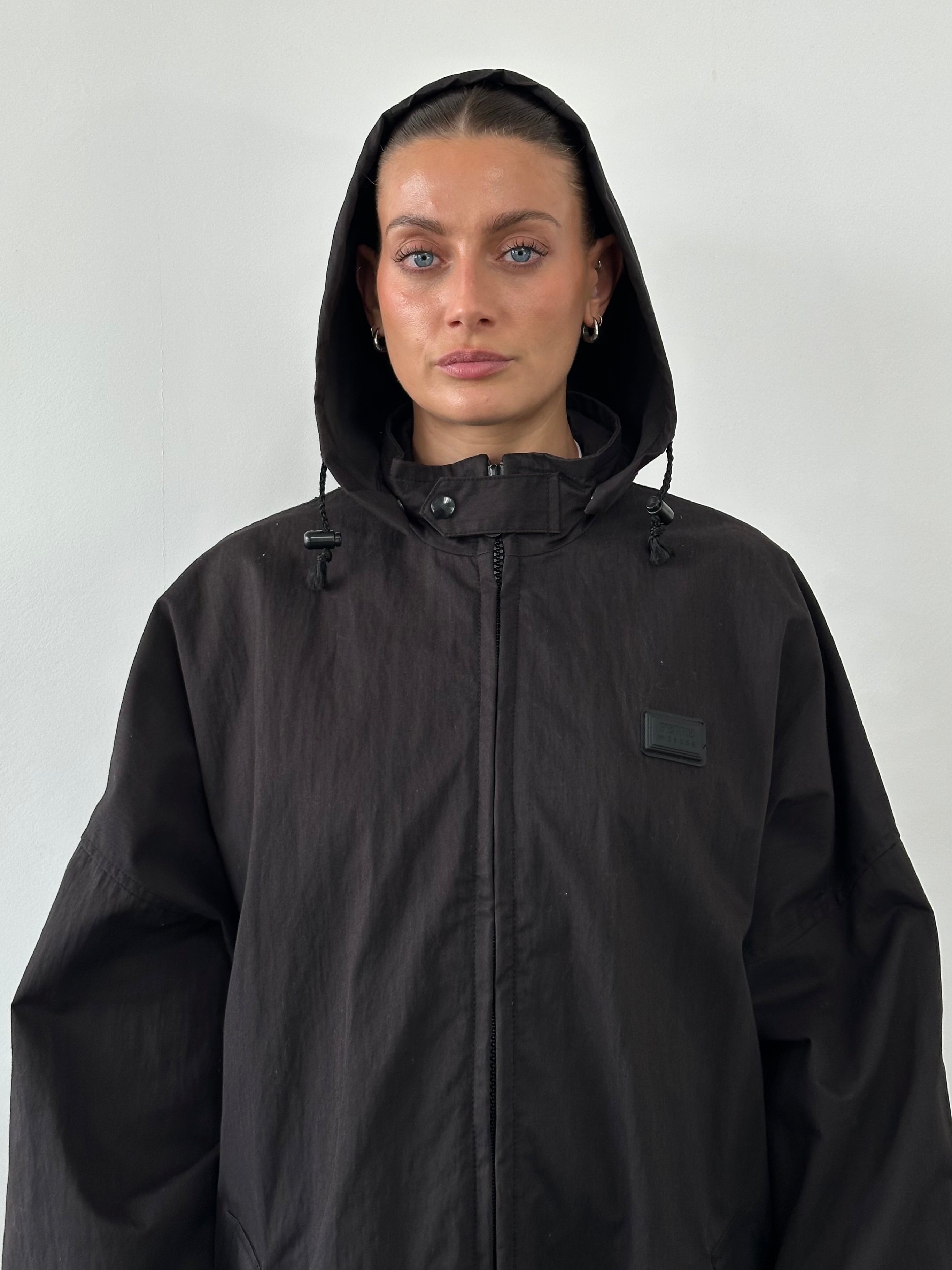 Gianfranco Ferre crinkle hooded parka coat in XL size, showcasing the textured fabric, hood, and casual fit.