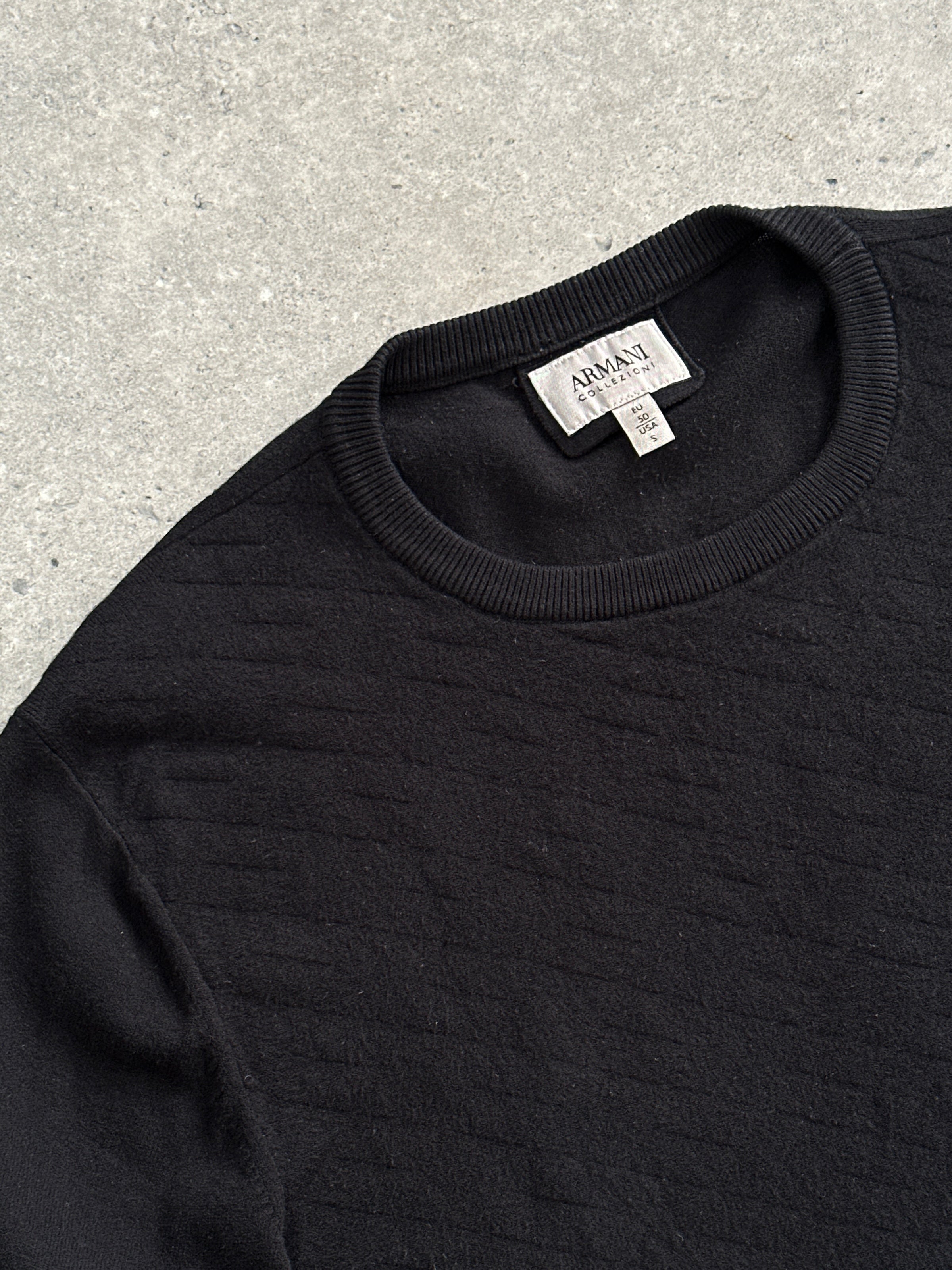 Armani Collezioni textured jumper in size M/L, featuring a cozy knit pattern and classic design, displayed on a neutral background.