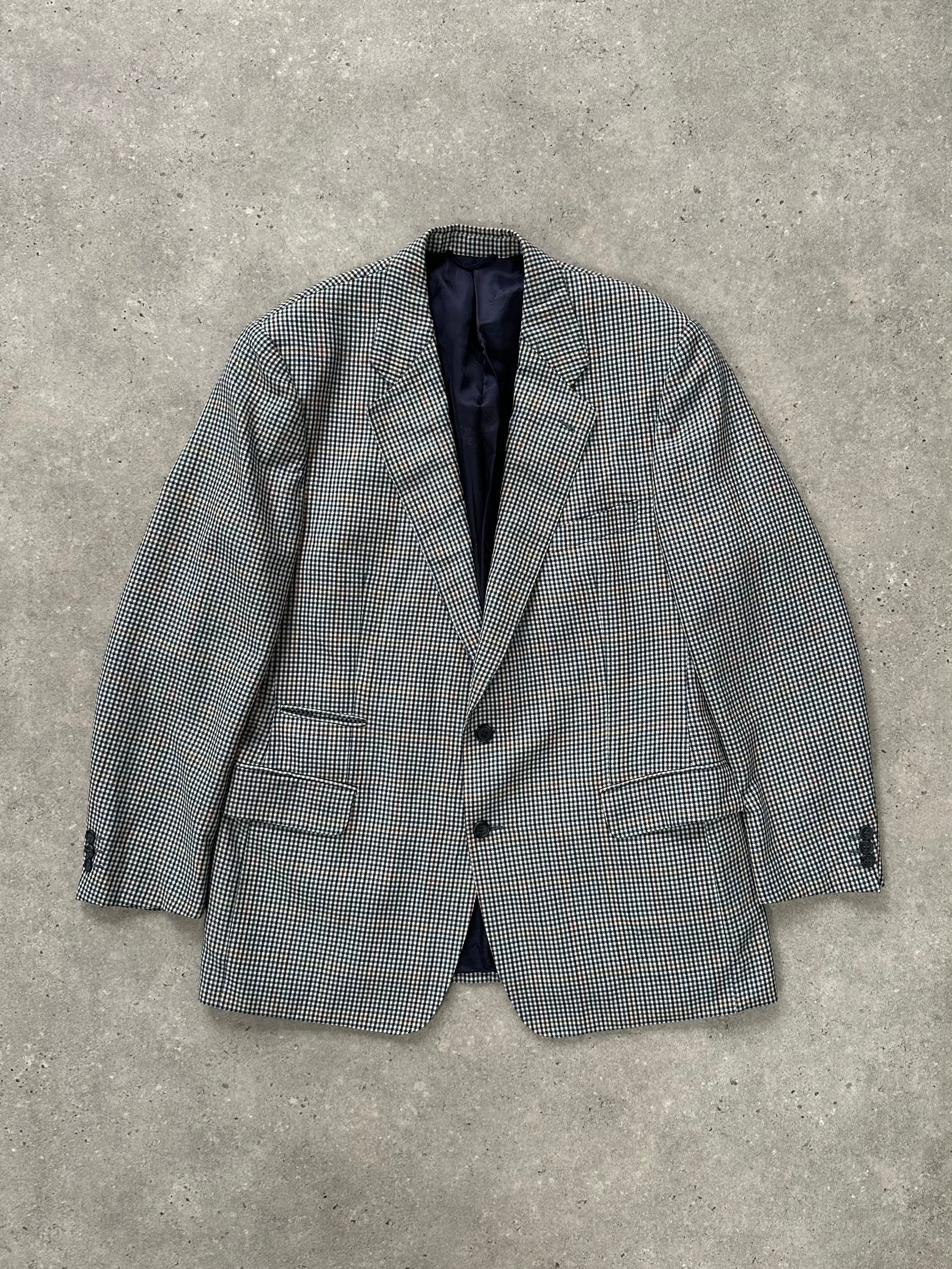 Burberry 1990s check wool blazer, single-breasted with notch lapel, size 44R/XL, featuring classic tartan pattern and tailored fit.