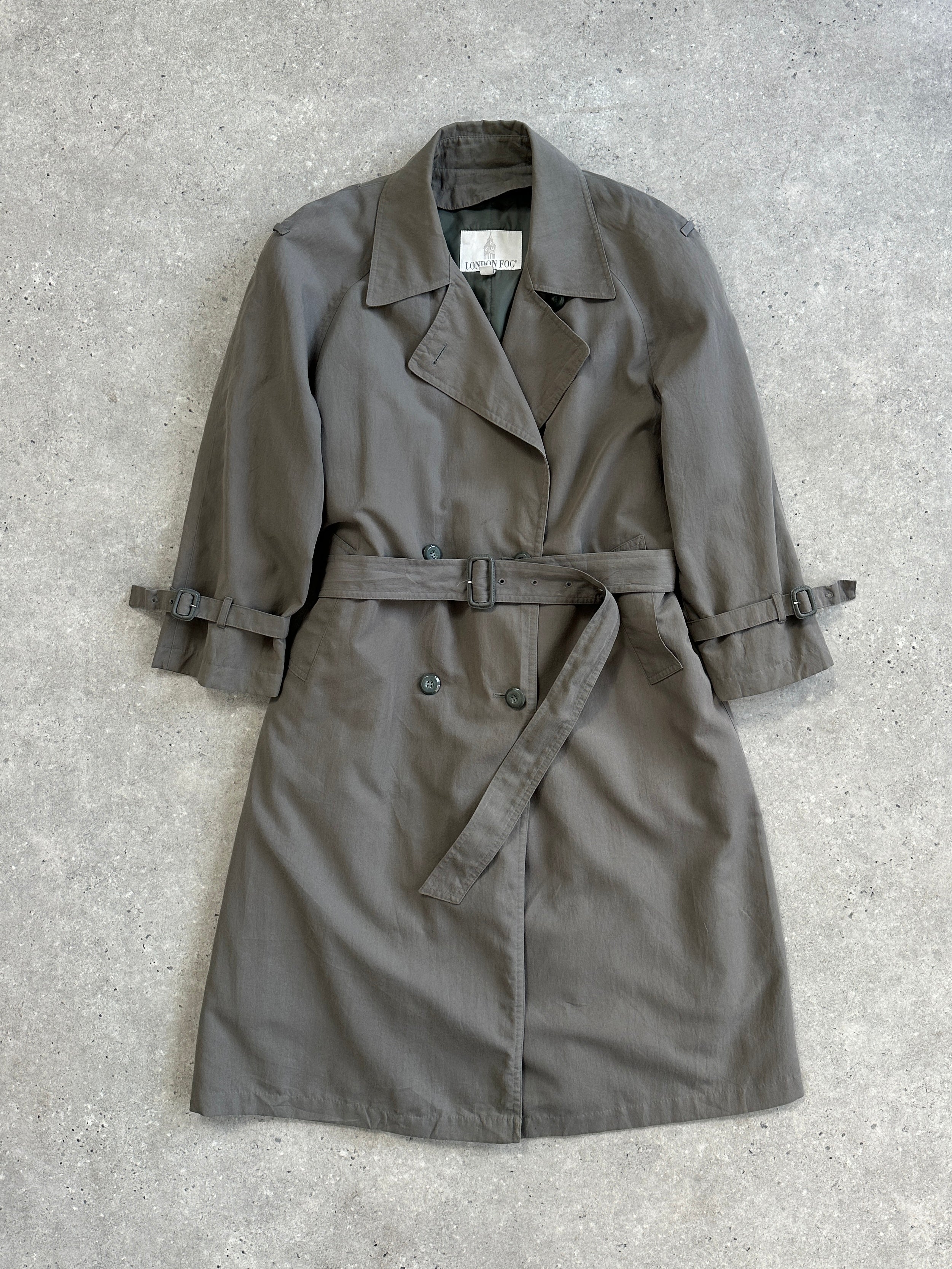 London Fog double breasted trench coat in size S/M, showing classic beige color, collar, and button details.