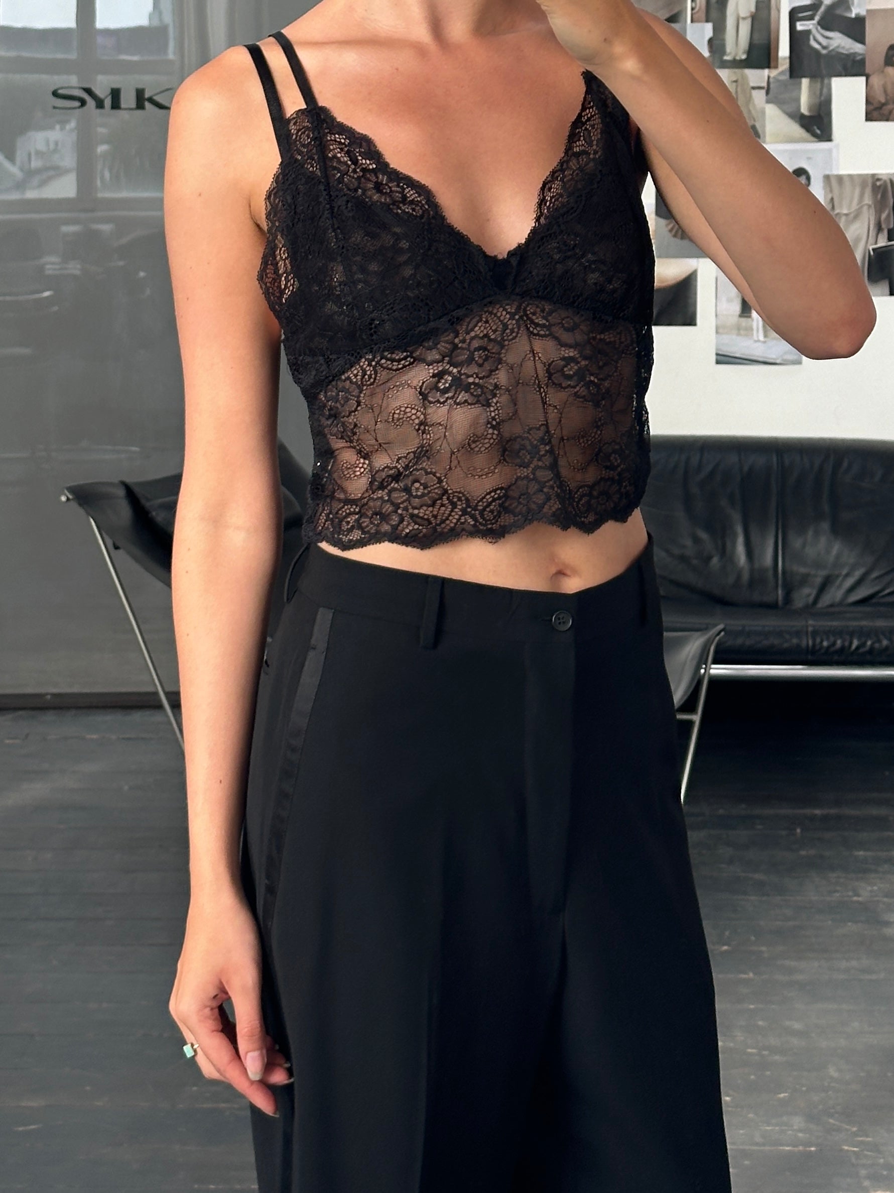 Vintage 2010s lace bralette top in size large, featuring delicate lace fabric and a feminine, retro-inspired design.