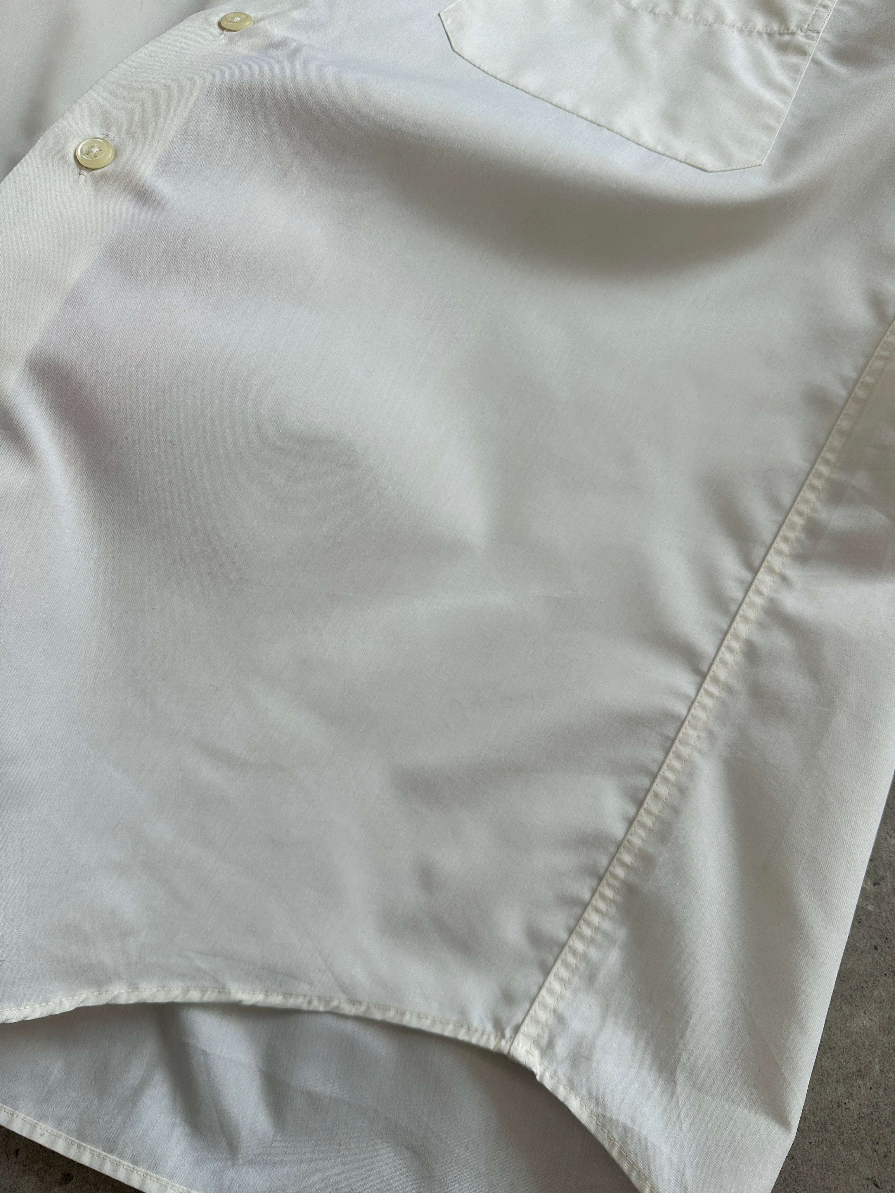 Yves Saint Laurent Pour Homme 1990s cotton logo shirt, men's size L, white shirt with YSL branding on the front.