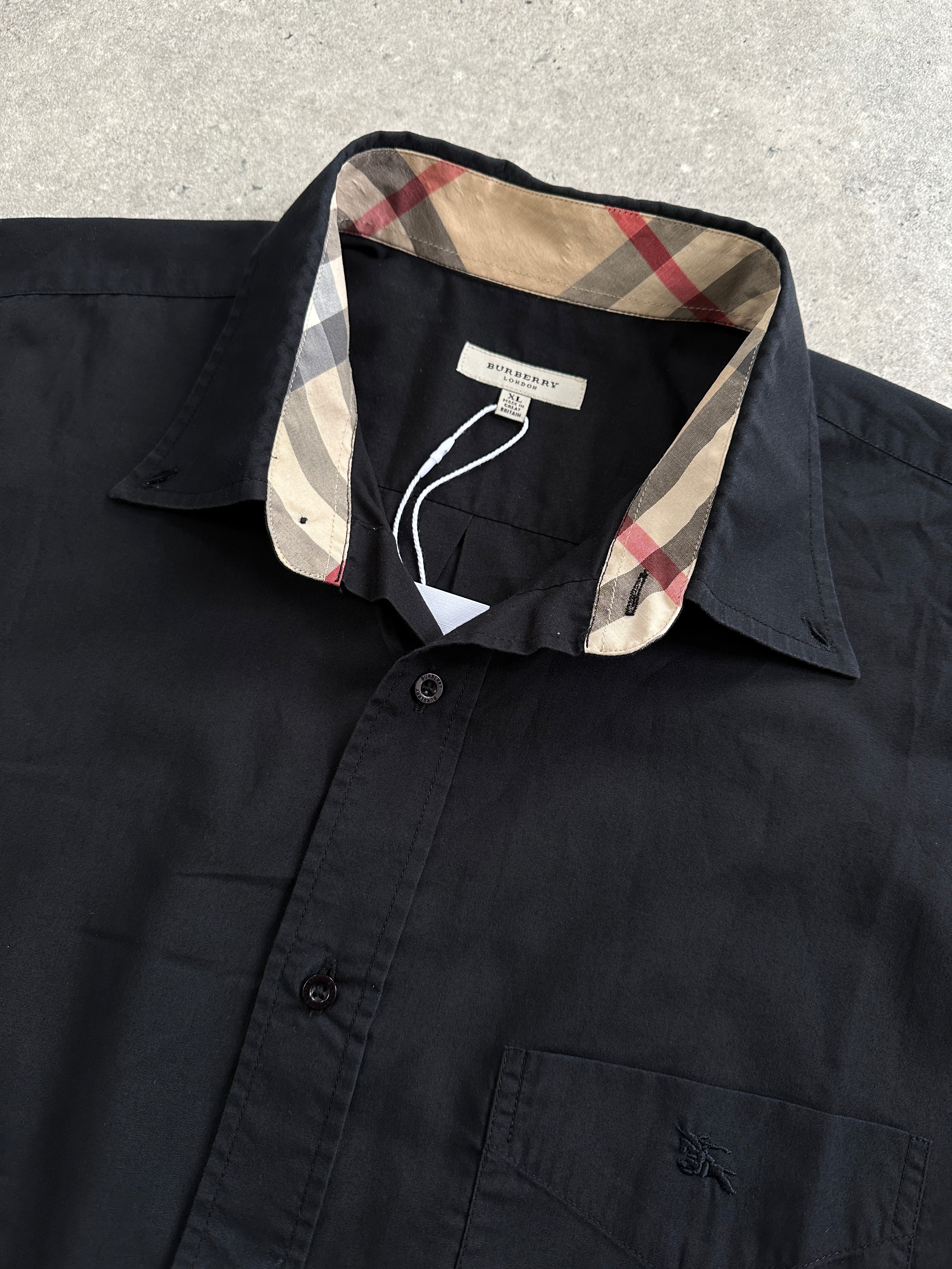 Burberry London pure cotton logo shirt in size XL, featuring a classic design with the iconic Burberry logo on the front.