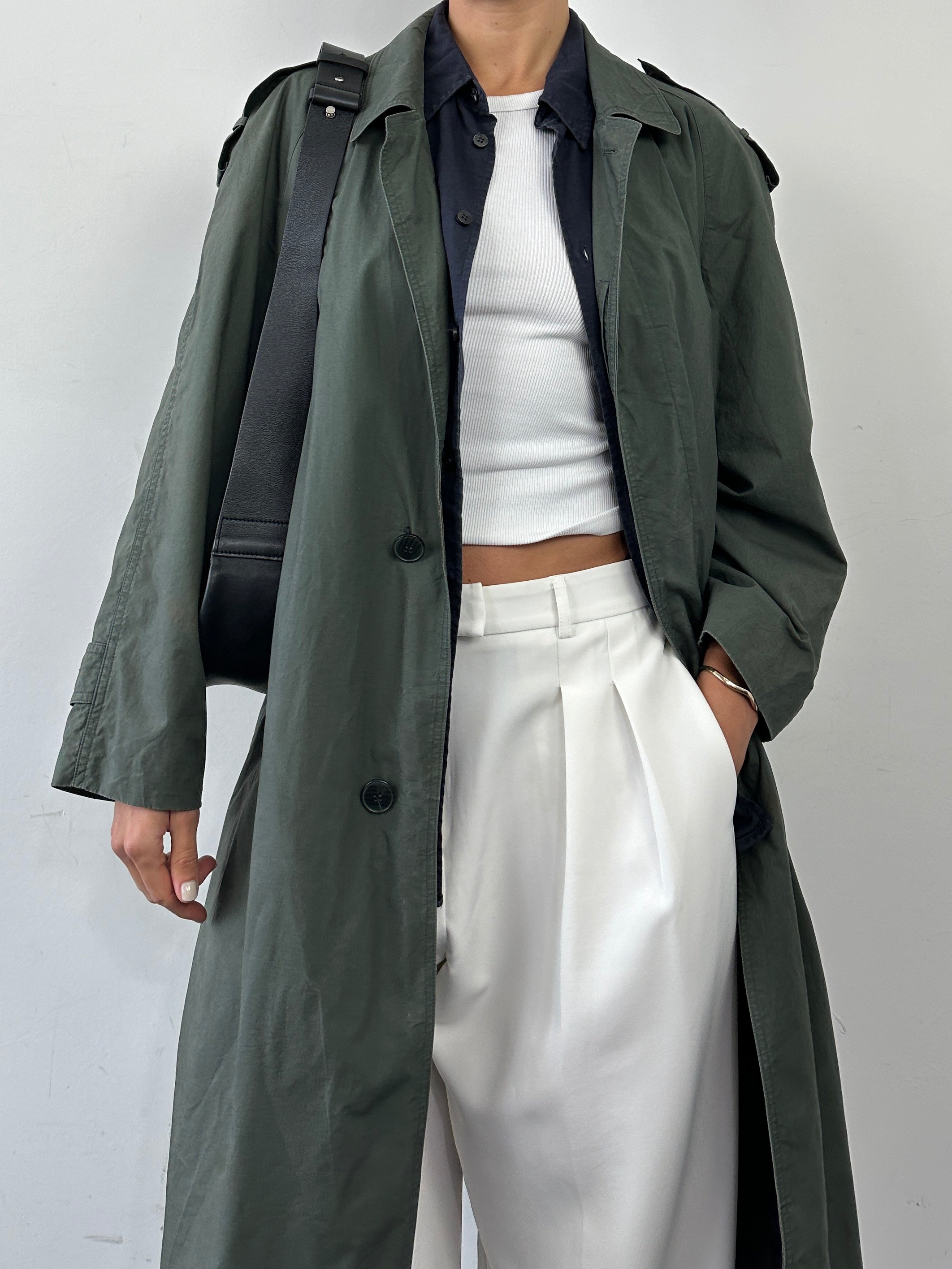 Yves Saint Laurent Diffusion Hommes pure cotton trench coat with concealed placket, shown in size L, featuring classic design and neutral color.