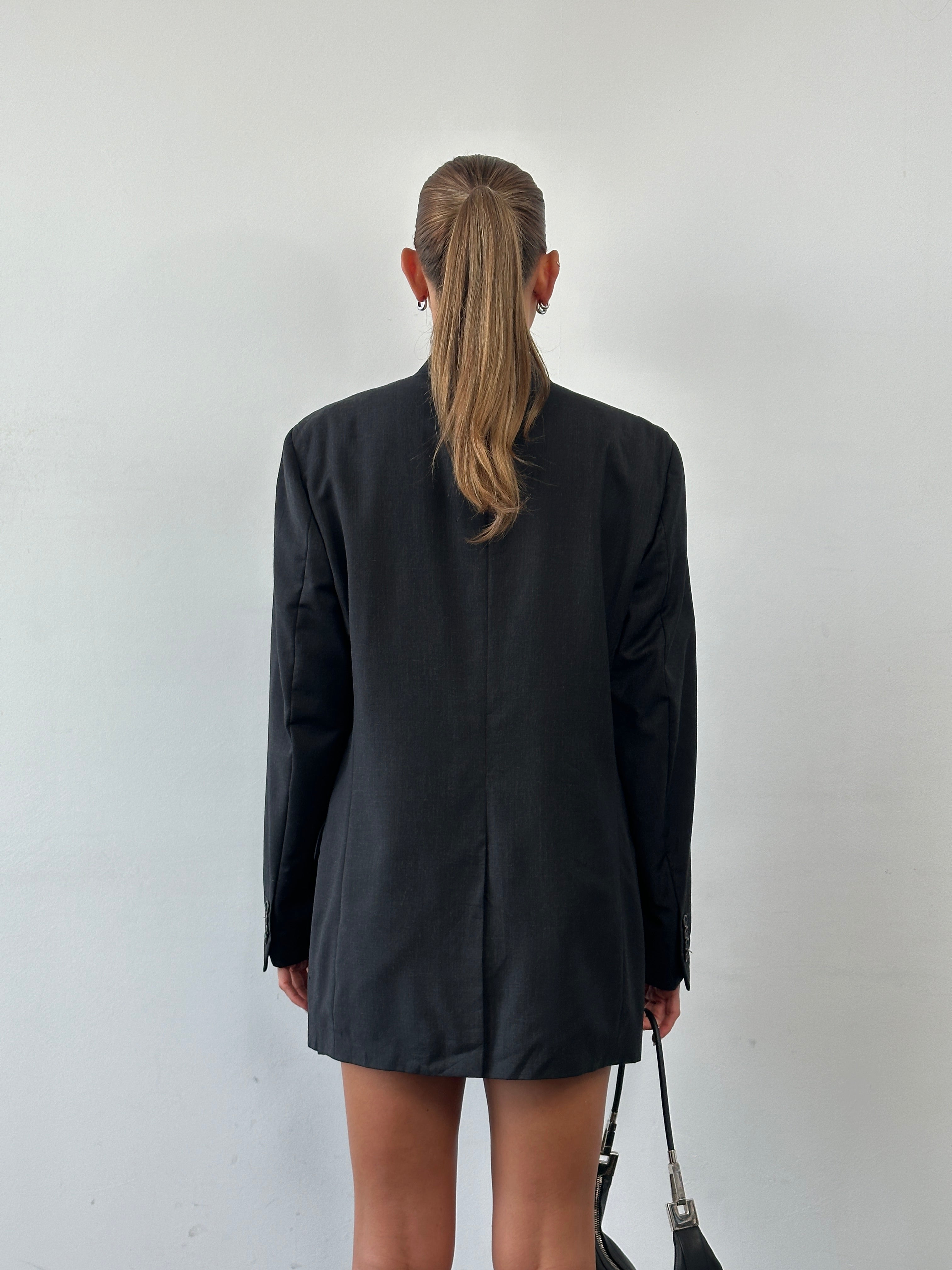 Yves Saint Laurent Pour Homme 1990s pure wool single-breasted blazer, size 40R/XL, in classic dark color with notch lapel.