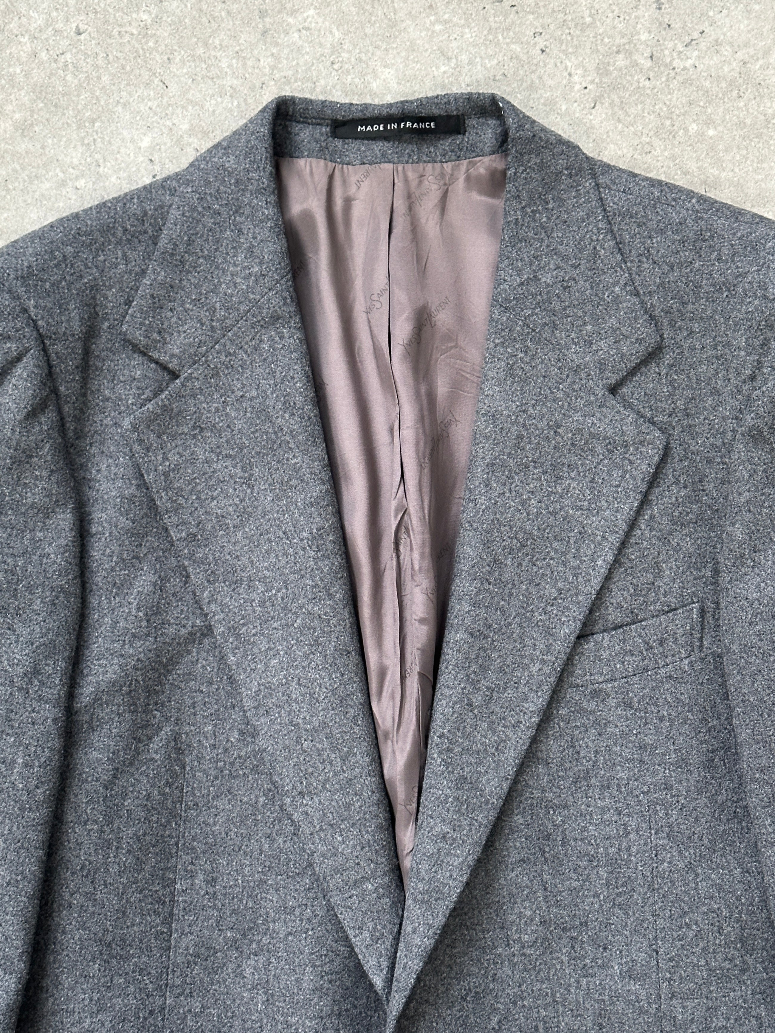 Yves Saint Laurent 1990s single-breasted brushed wool blazer in size 38R/L, shown in dark gray with classic tailored fit.