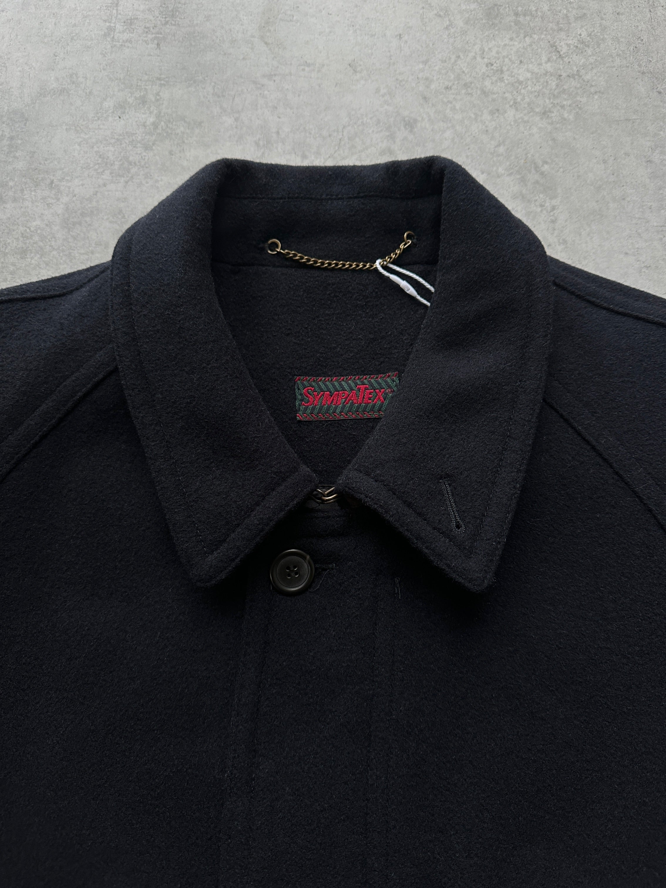 Vintage 1980s wool coat with concealed placket, belted design in XXL size, featuring classic style and textured fabric.