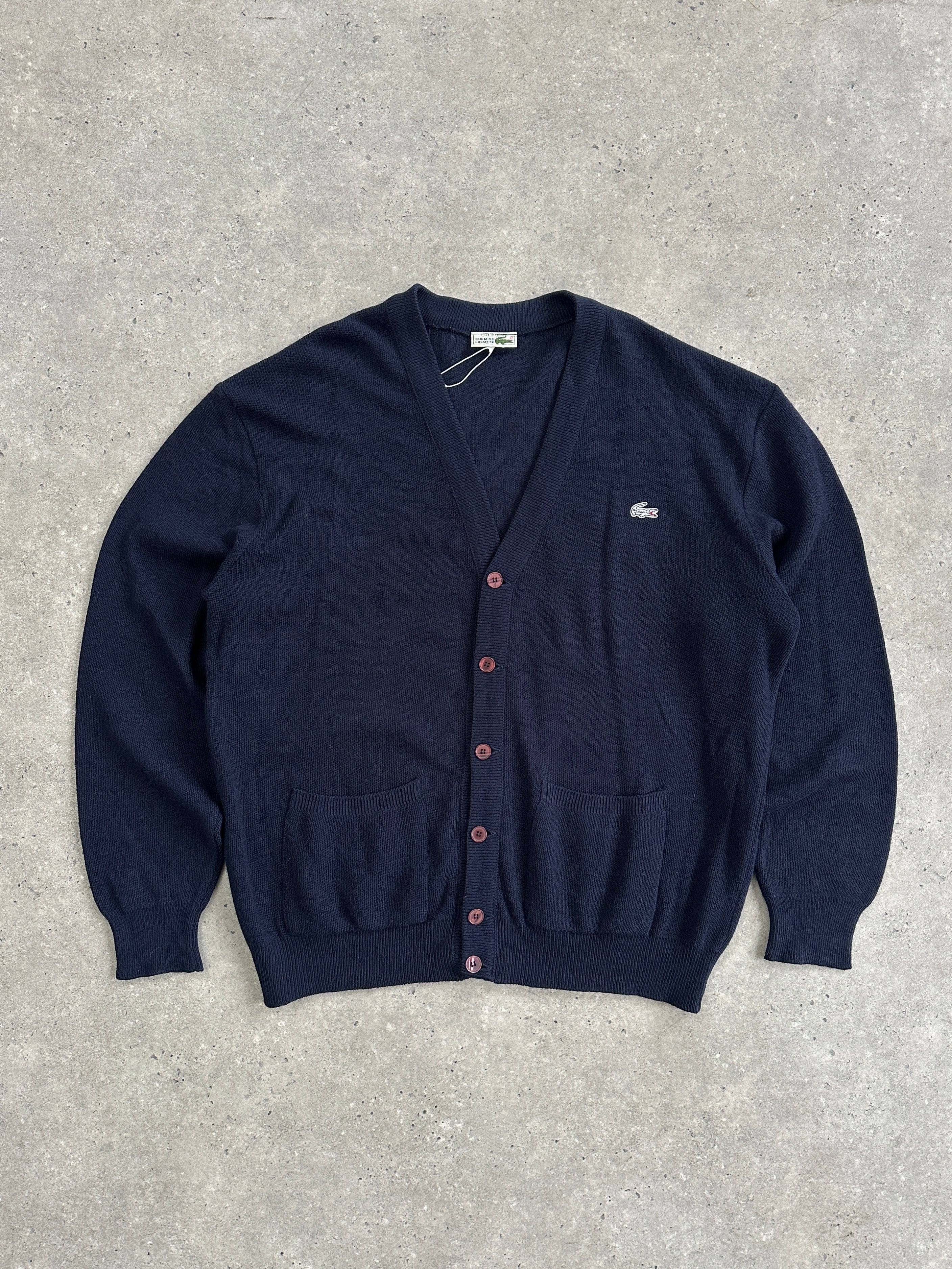 Lacoste wool logo knitted cardigan in XL/XXL, featuring a classic design with the iconic crocodile logo and ribbed cuffs.