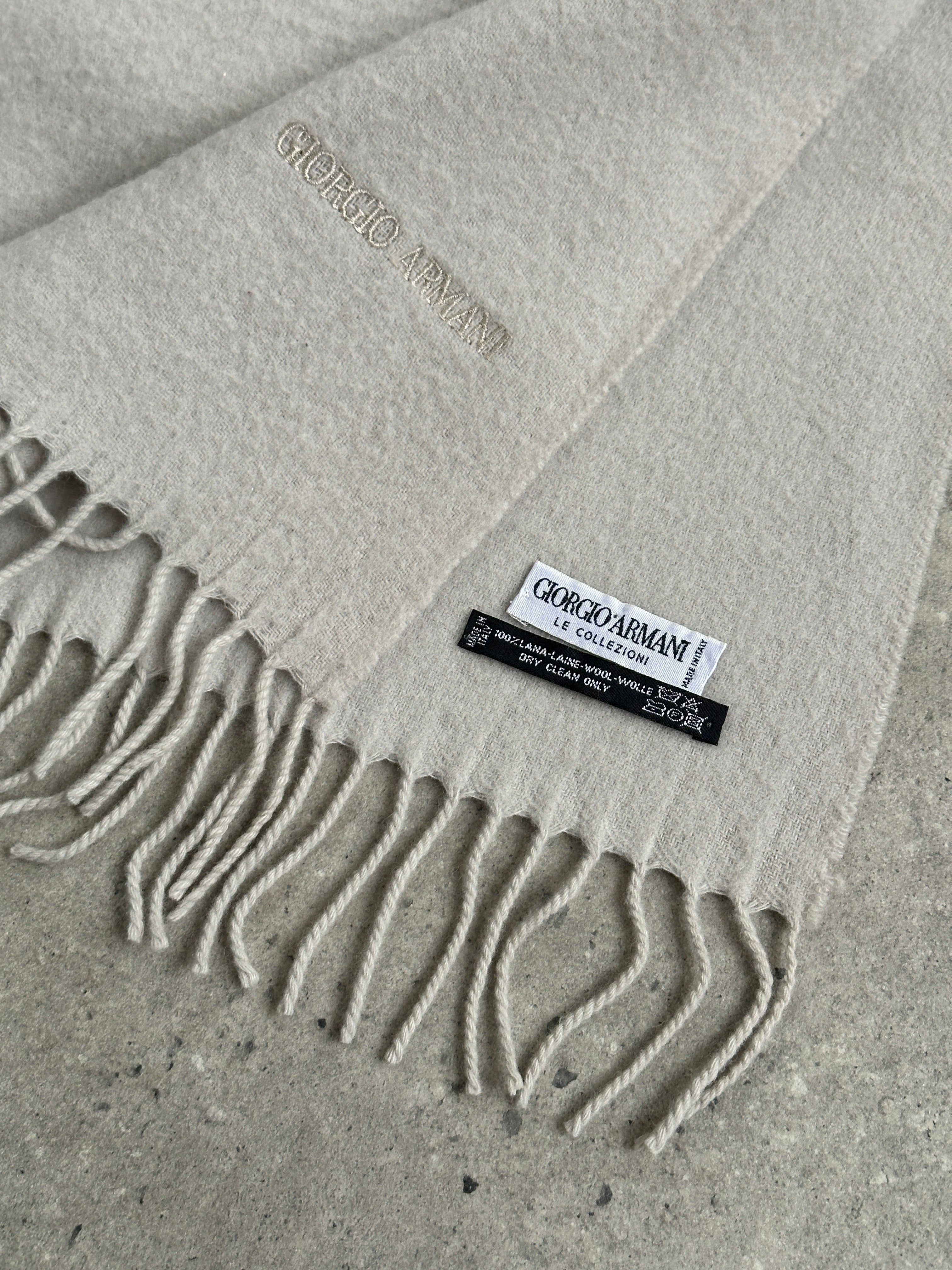Giorgio Armani Le Collezioni 2000s pure wool scarf with subtle logo pattern, soft texture, and classic design.
