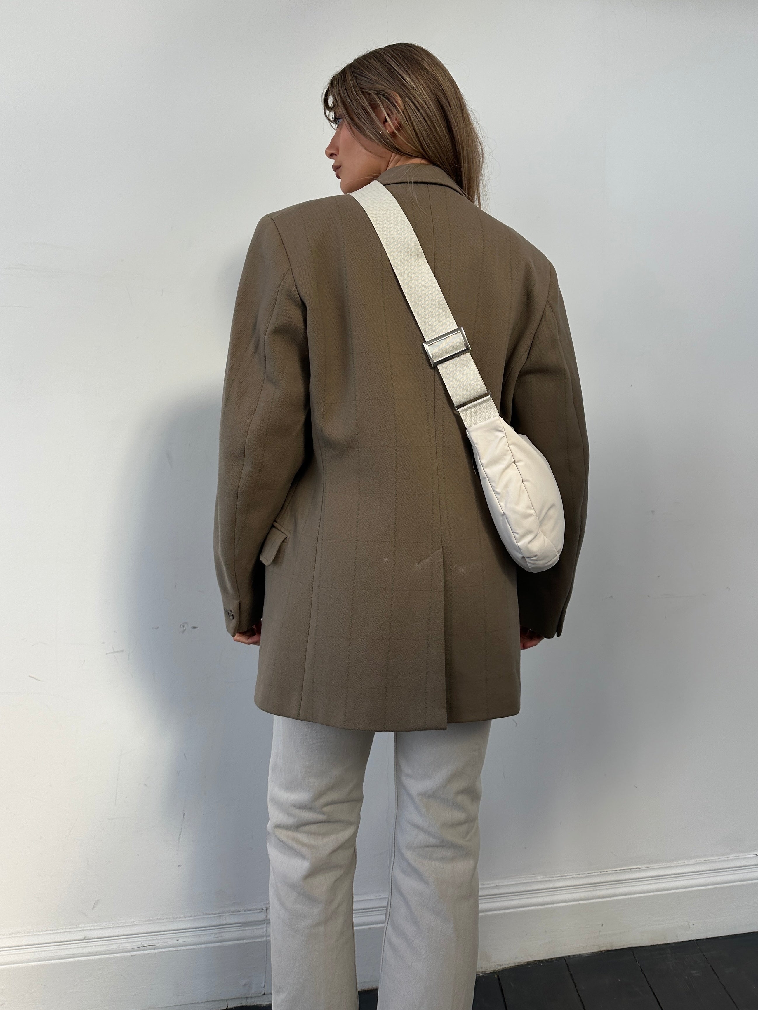 Vintage British thick wool check blazer coat in size L/XL, featuring classic plaid pattern and tailored fit.