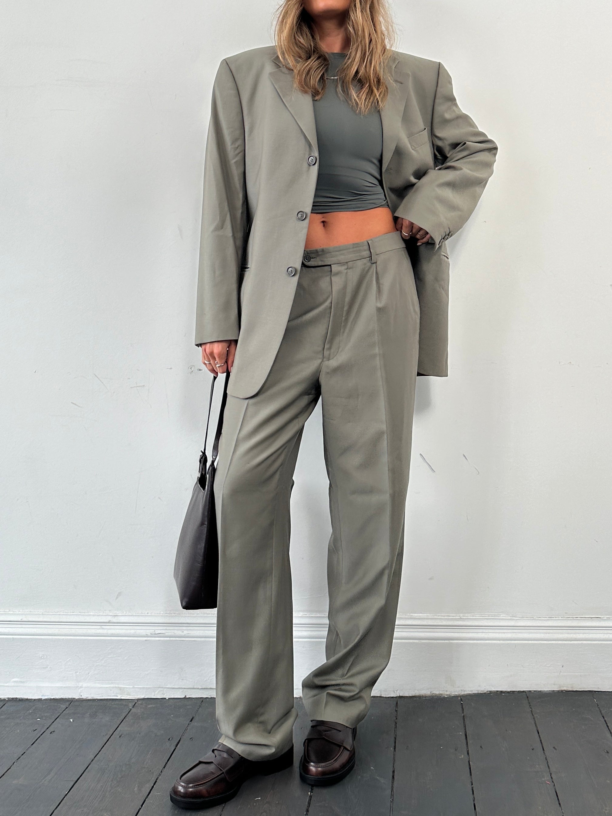 Pierre Cardin pure wool single-breasted jumpsuit in size 40R/W33, featuring a tailored fit and classic design.
