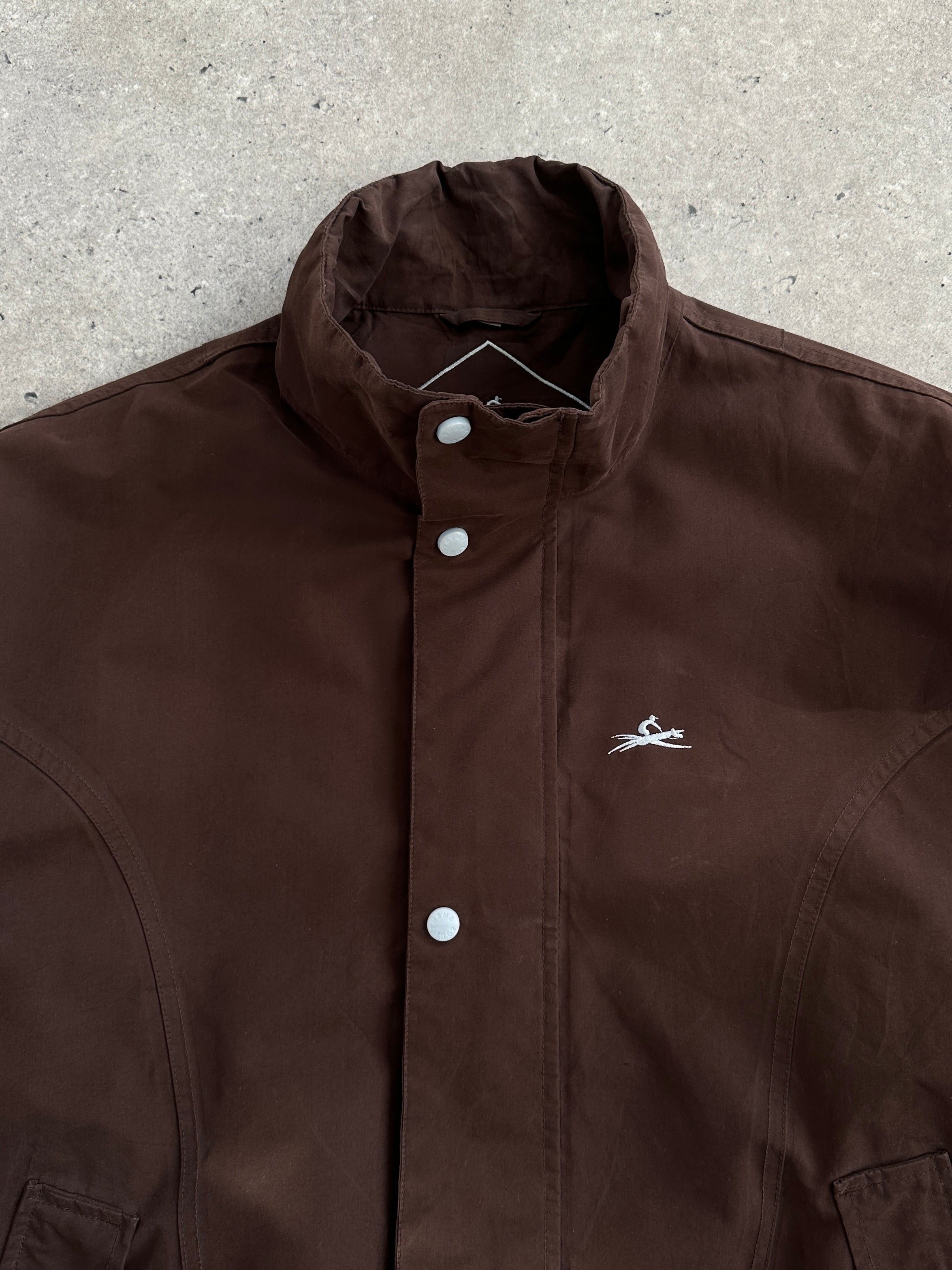 Vintage 2000s double zip boxy bomber jacket with a cropped fit, featuring front zippers and a retro style.