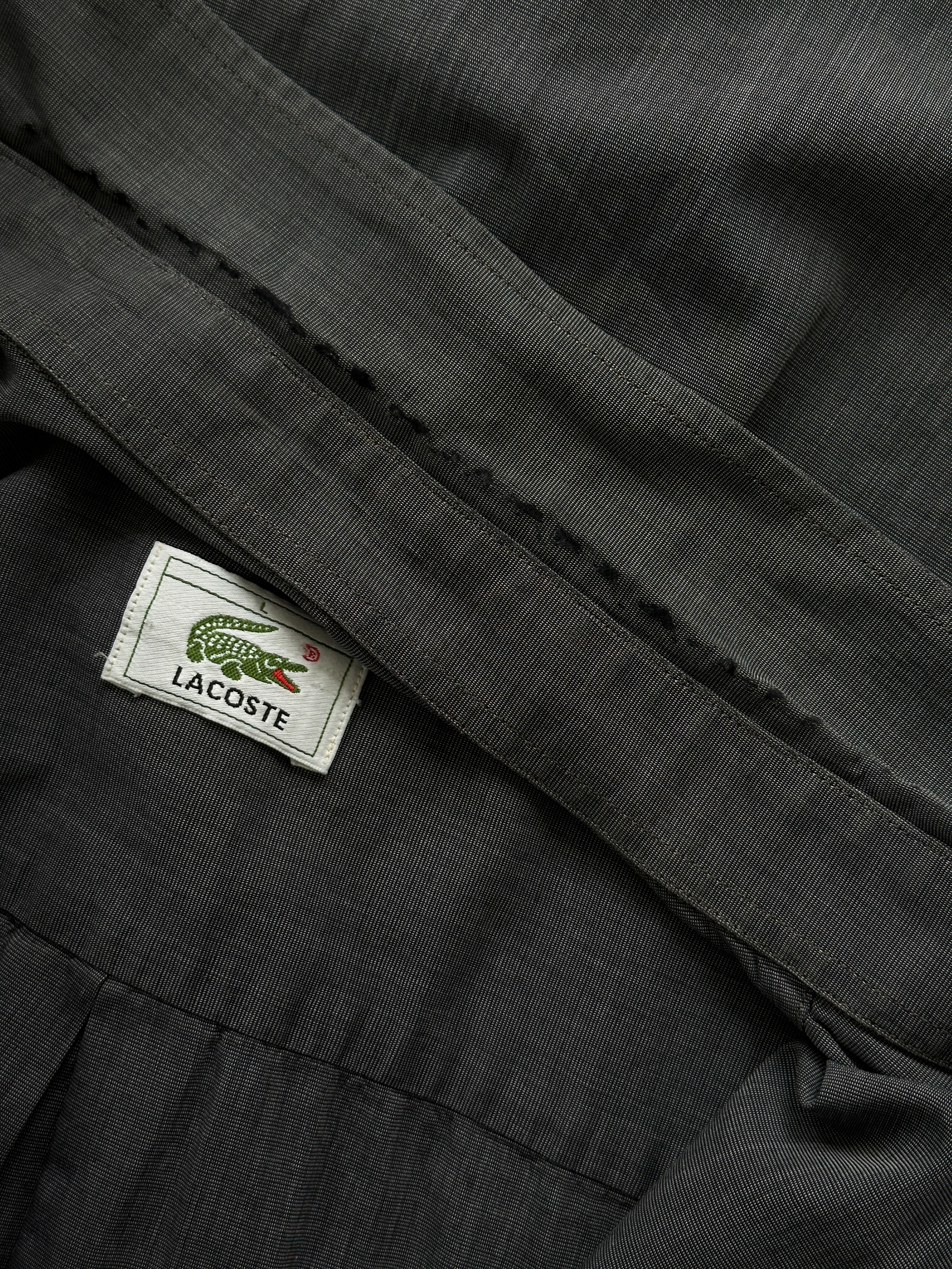 Lacoste pure cotton logo shirt in size L, featuring the iconic crocodile emblem on the front, white casual shirt for men.