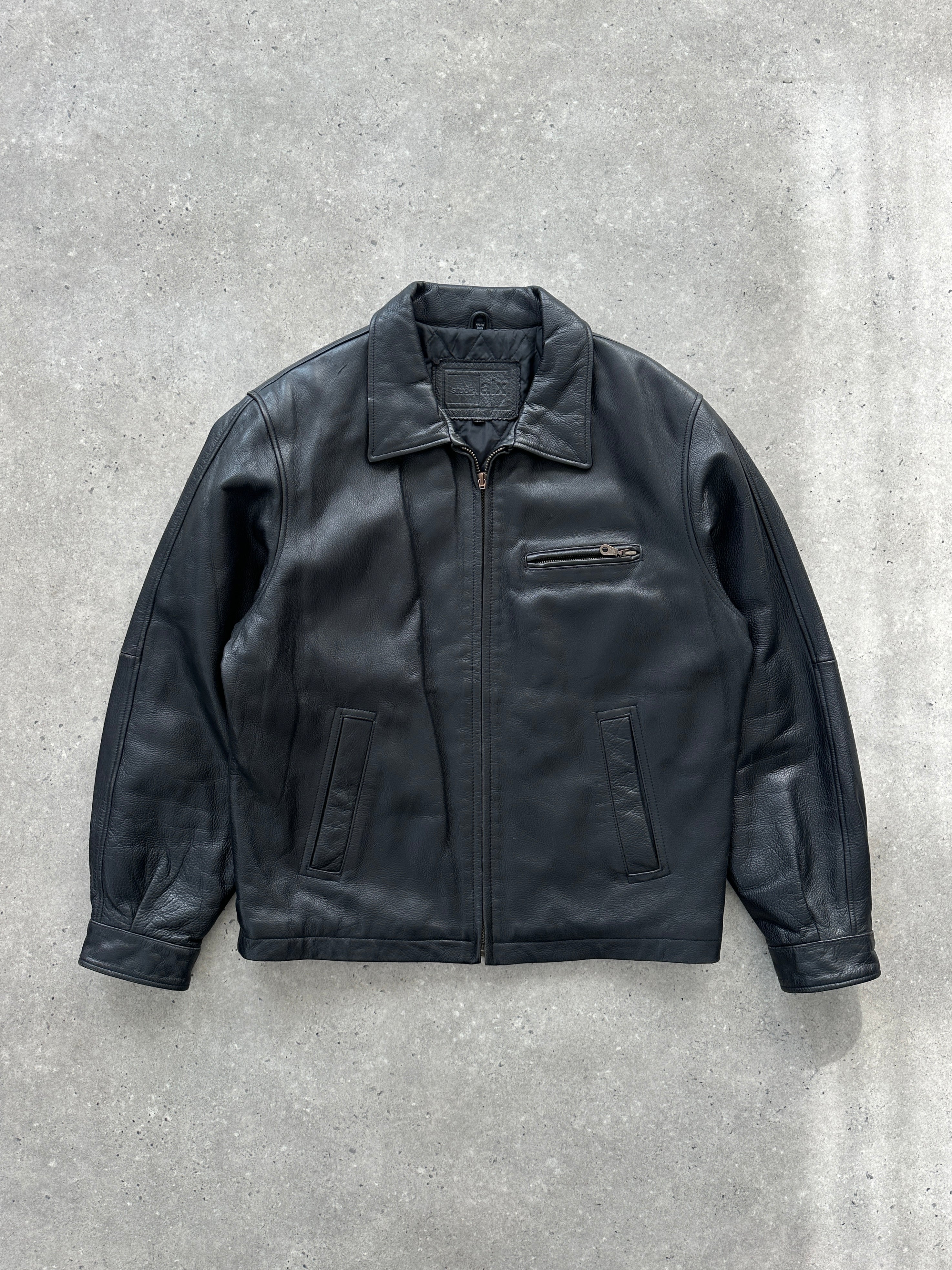 Vintage minimal leather jacket in size L, stylish and classic design with smooth leather finish, perfect for casual wear.
