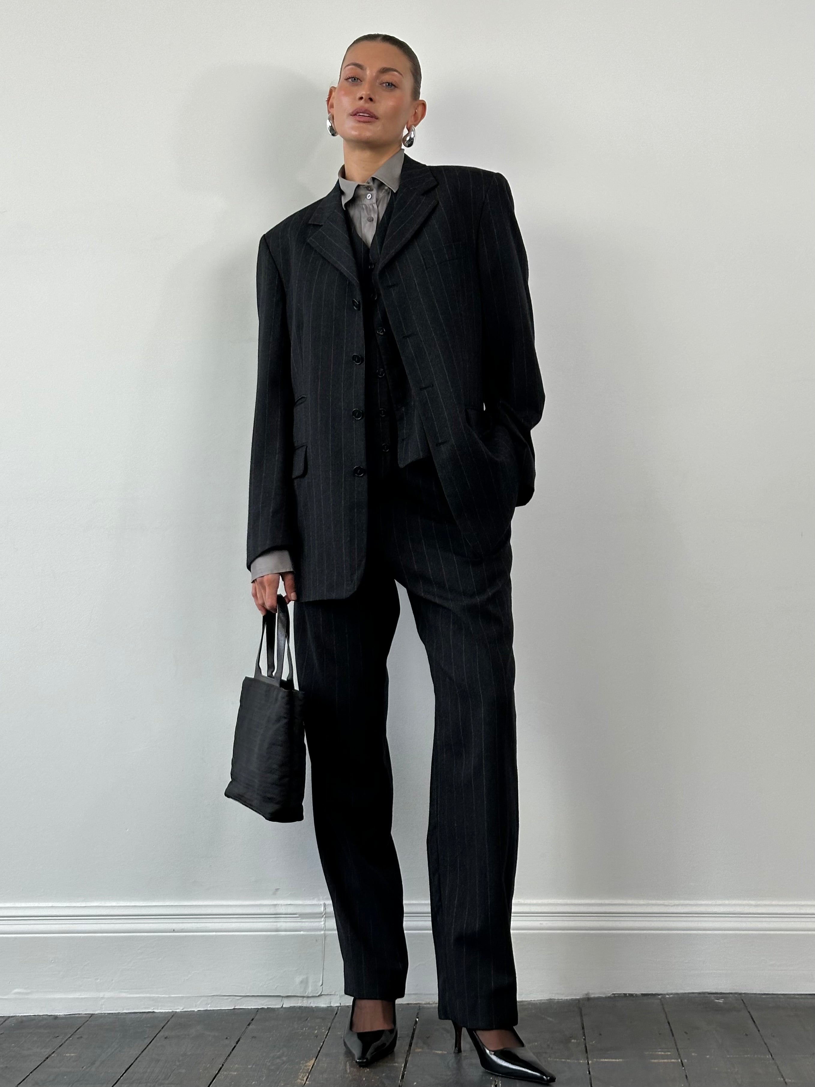 Yves Saint Laurent men's 1990s brushed wool pinstripe three-piece suit in size 40R/W30, featuring a tailored jacket, waistcoat, and trousers.