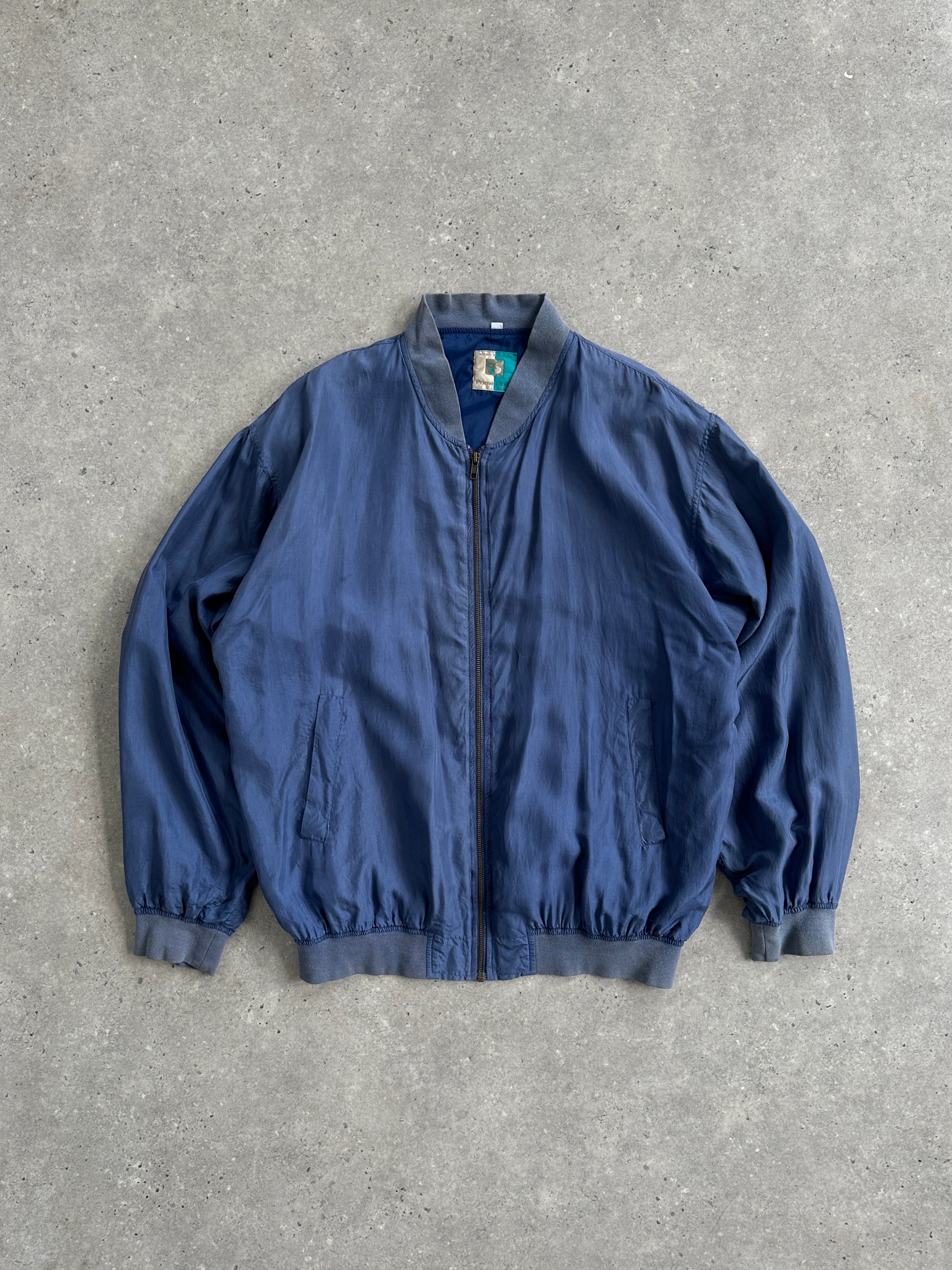 Vintage pure silk bomber jacket in XL, showcasing smooth fabric and classic design with ribbed cuffs and collar.