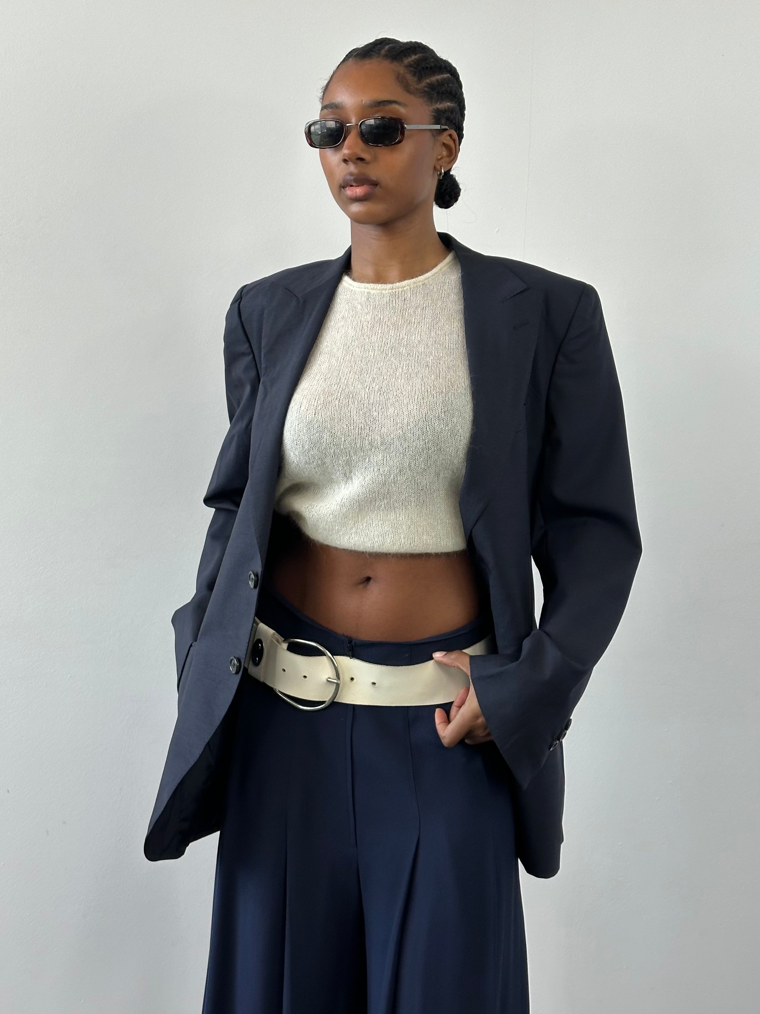 Yves Saint Laurent Rive Gauche 1990s pure wool blazer in size 36R/M, tailored fit with classic lapel and button closure.